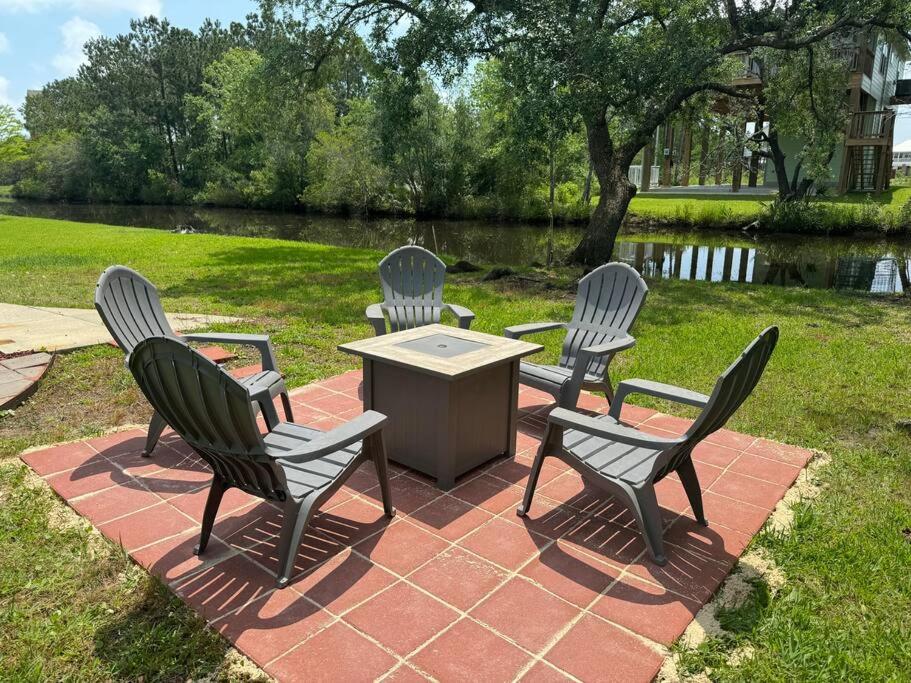 Waterfront Home Game Room Ping Pong Outdoor Bar Area