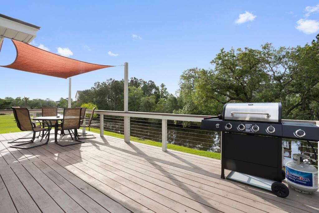 Waterfront Home Game Room Ping Pong Outdoor Bar Area
