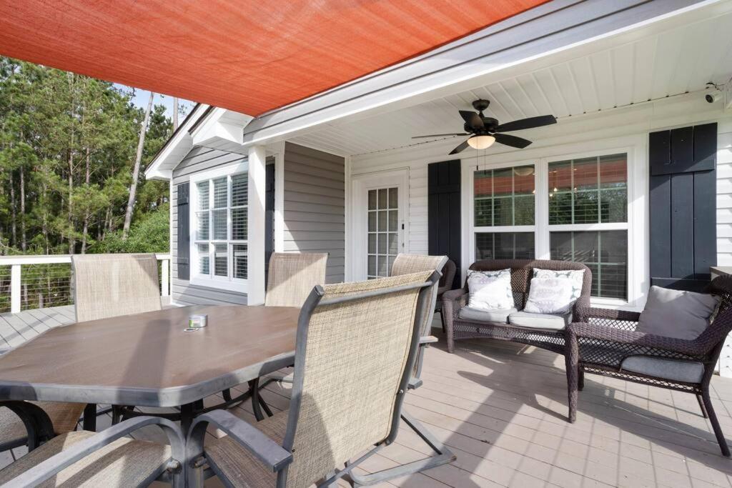 Waterfront Home Game Room Ping Pong Outdoor Bar Area
