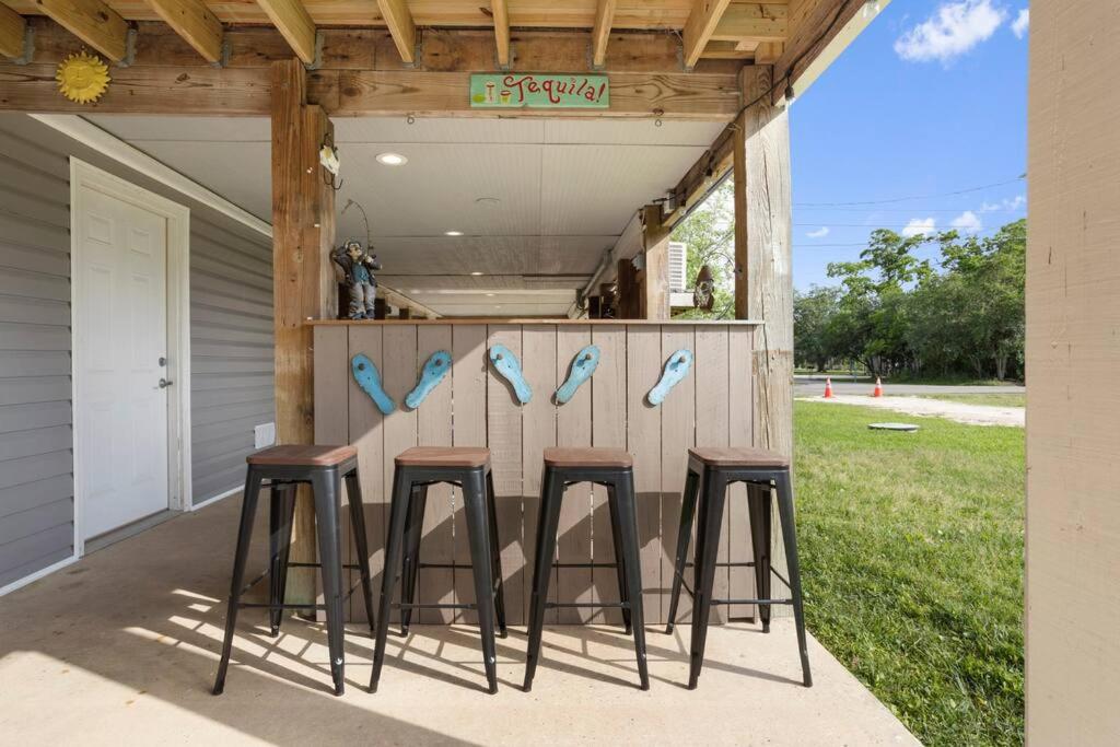 Waterfront Home Game Room Ping Pong Outdoor Bar Area