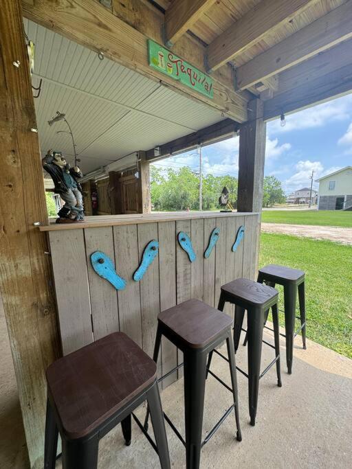 Waterfront Home Game Room Ping Pong Outdoor Bar Area