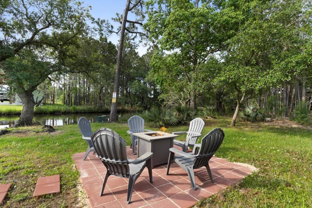 Waterfront Home Game Room Ping Pong Outdoor Bar Area