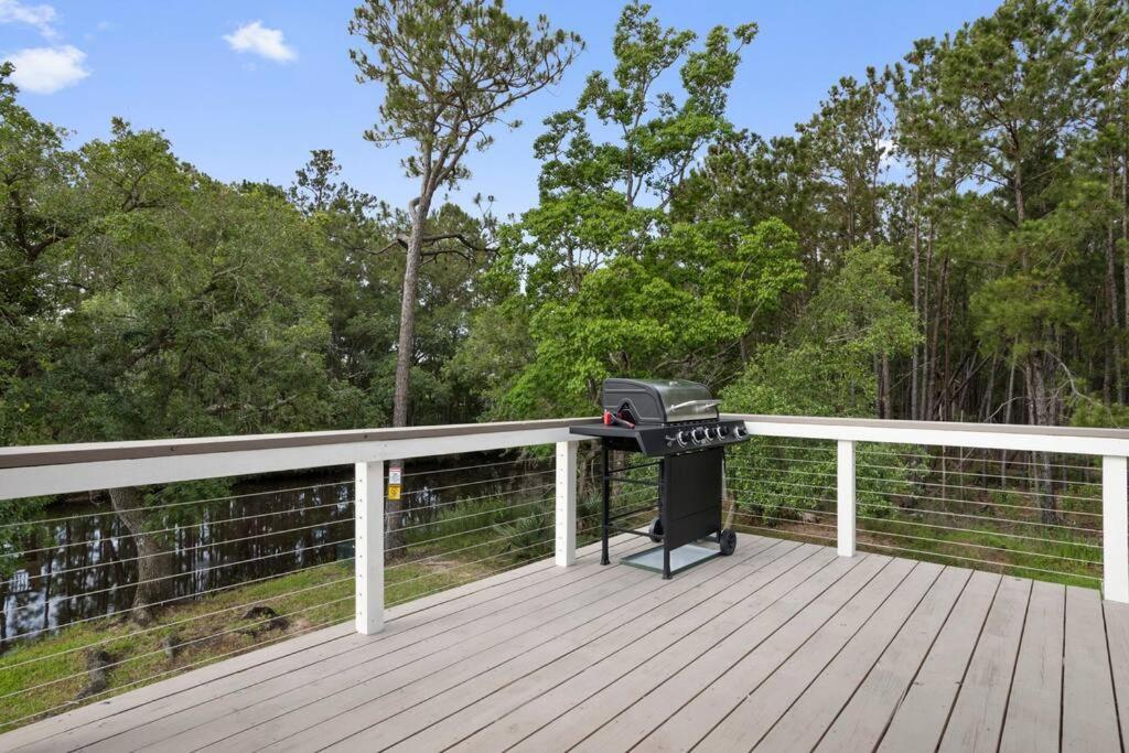 Waterfront Home Game Room Ping Pong Outdoor Bar Area