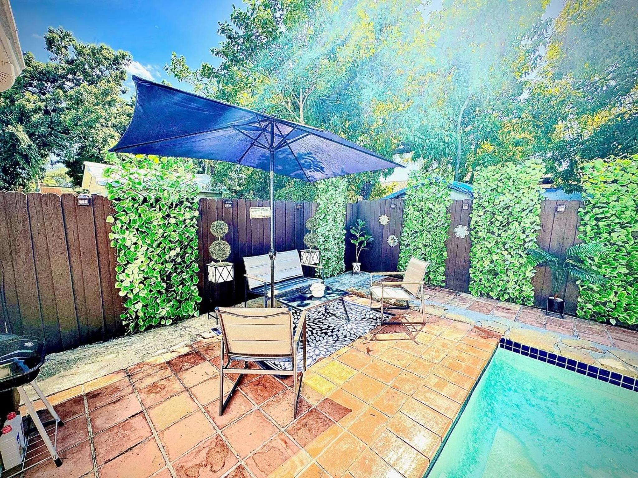 Stay Central: Relax in Our Heated Pool Oasis