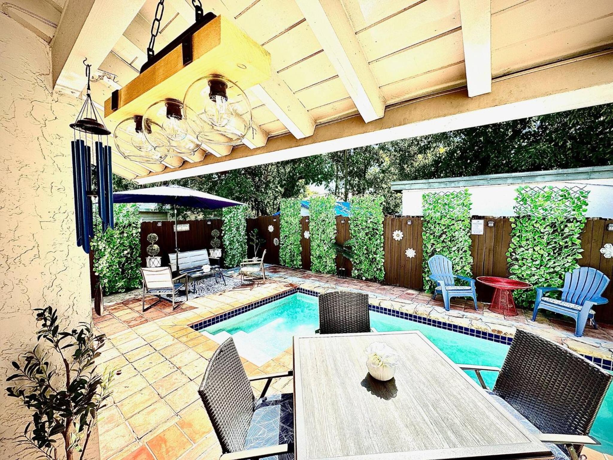Stay Central: Relax in Our Heated Pool Oasis