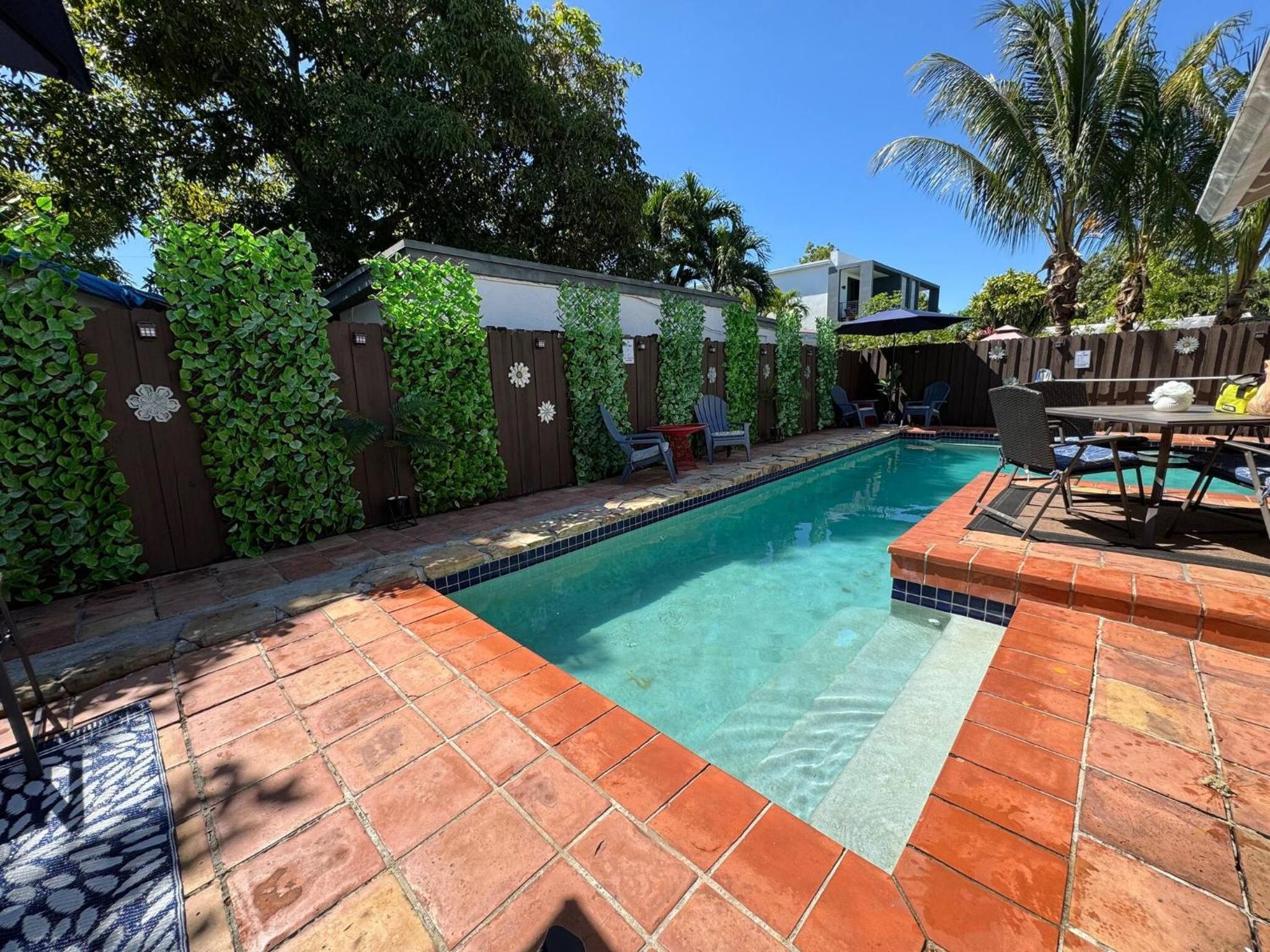 Stay Central: Relax in Our Heated Pool Oasis