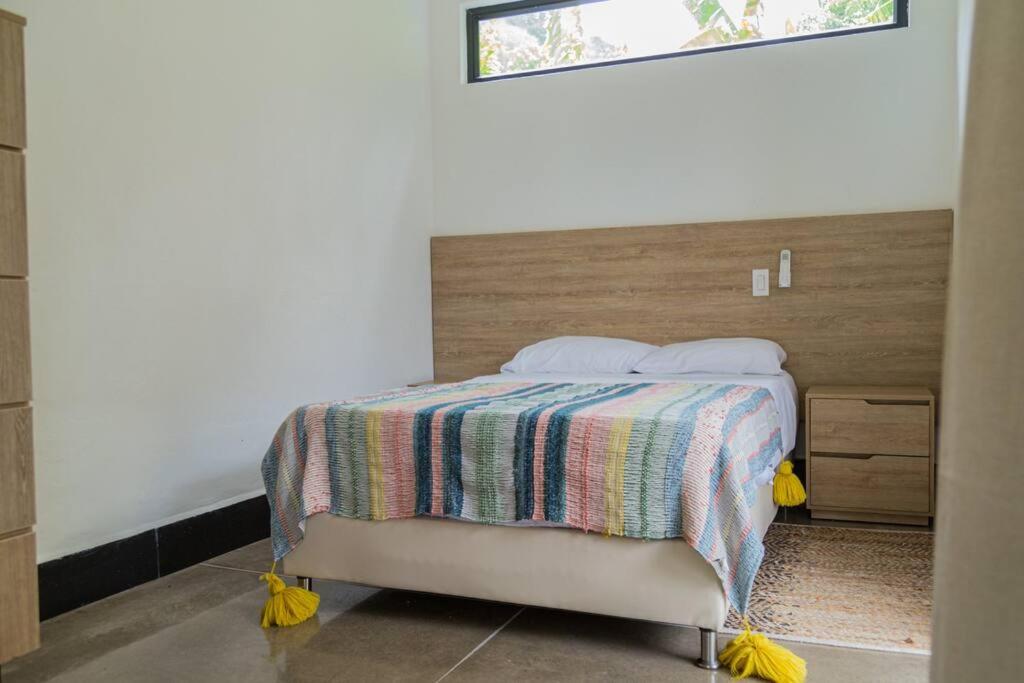 Casa junto al río en Bolombolo