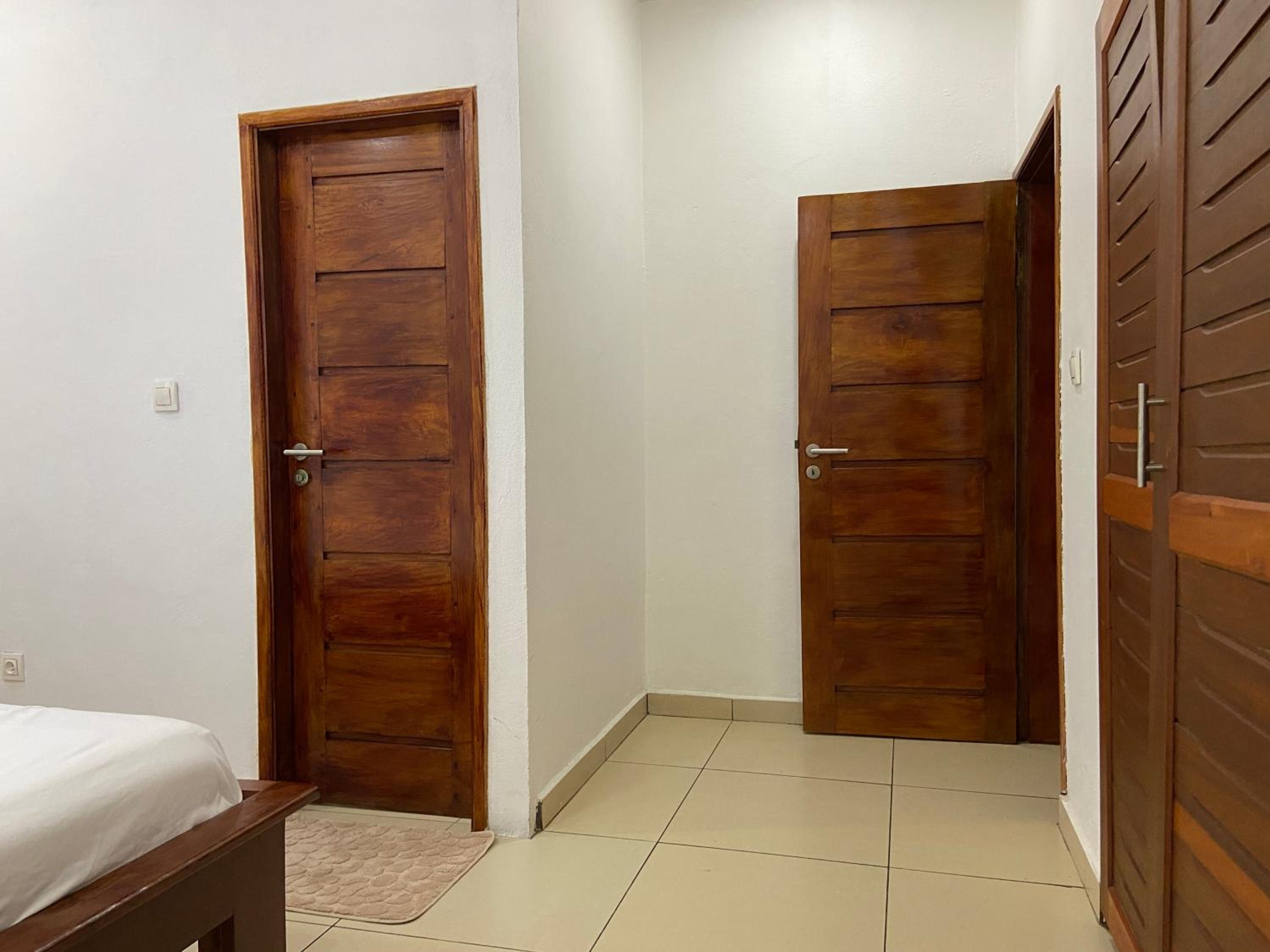 Stylish African-Chic Apartment - WiFi, Gardien, Parking, Climaté