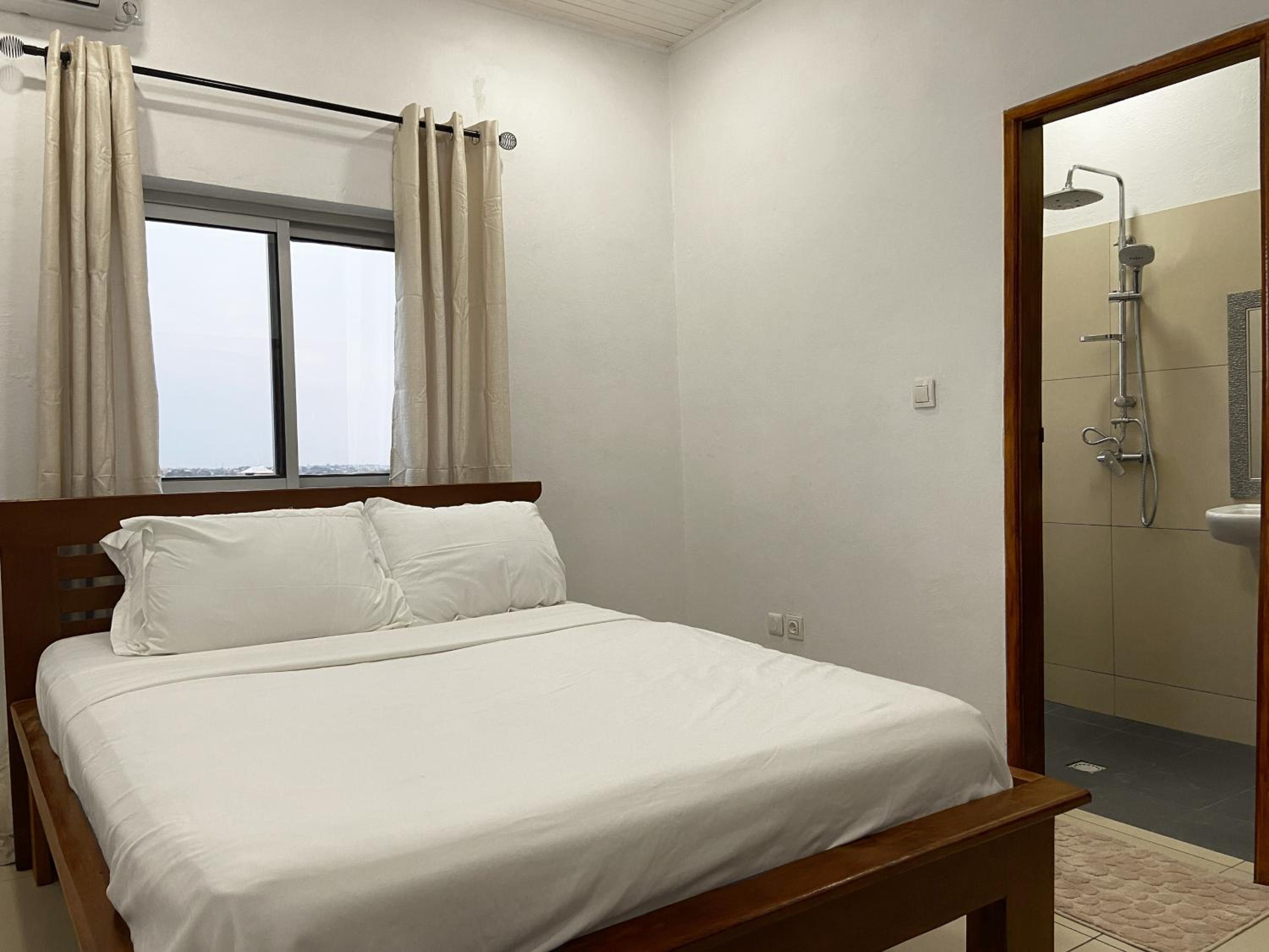 Stylish African-Chic Apartment - WiFi, Gardien, Parking, Climaté