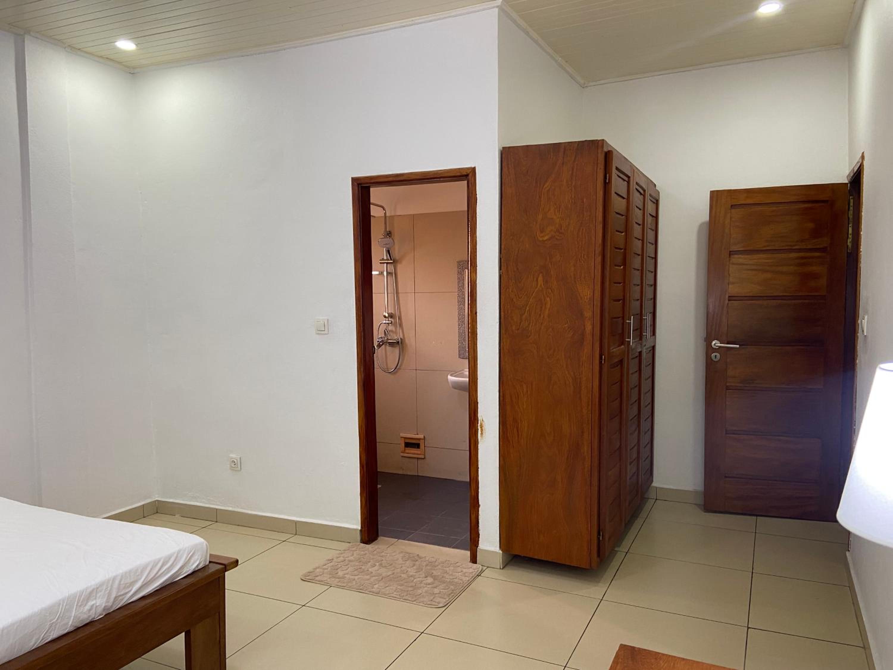 Stylish African-Chic Apartment - WiFi, Gardien, Parking, Climaté