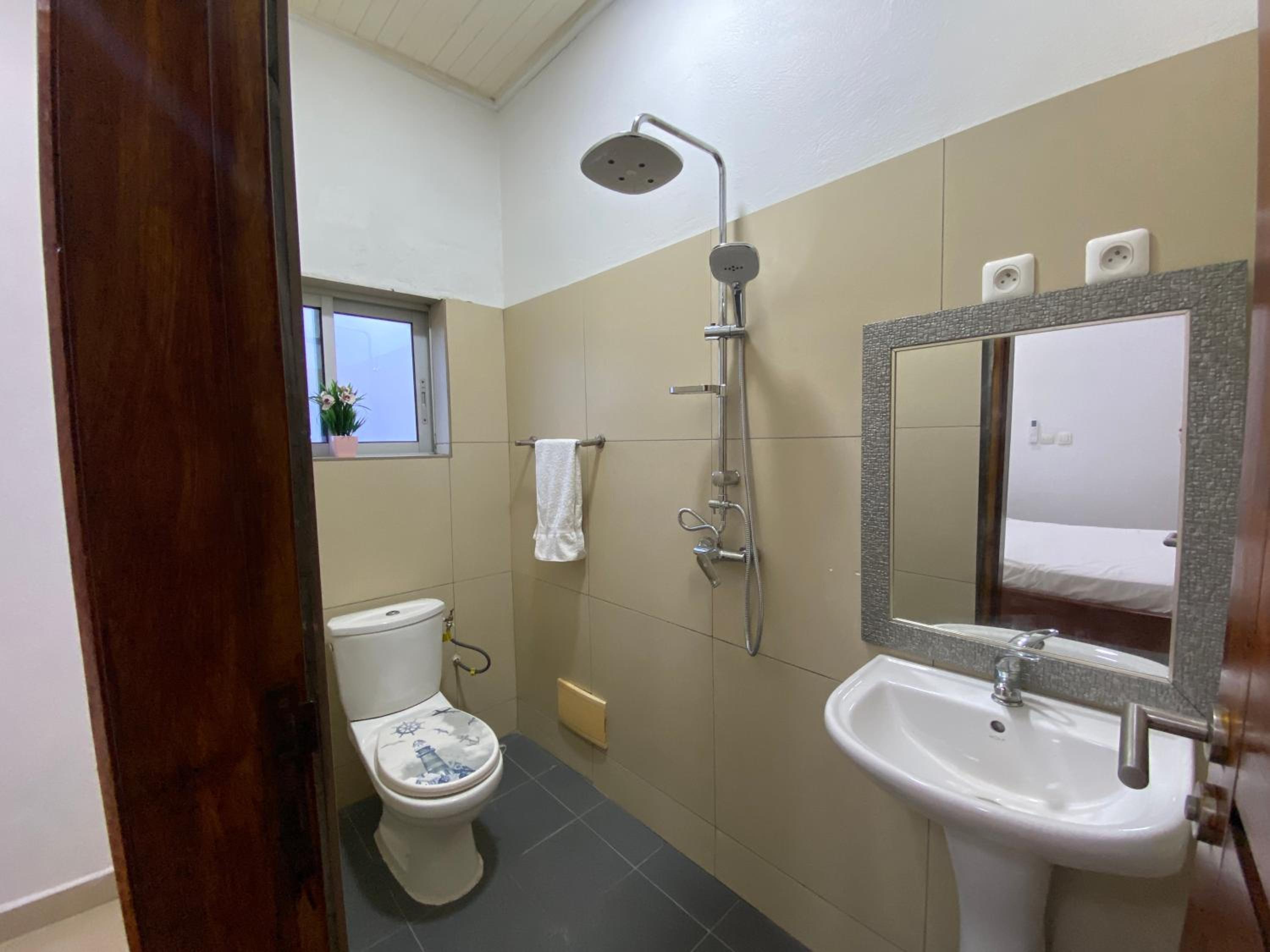 Stylish African-Chic Apartment - WiFi, Gardien, Parking, Climaté