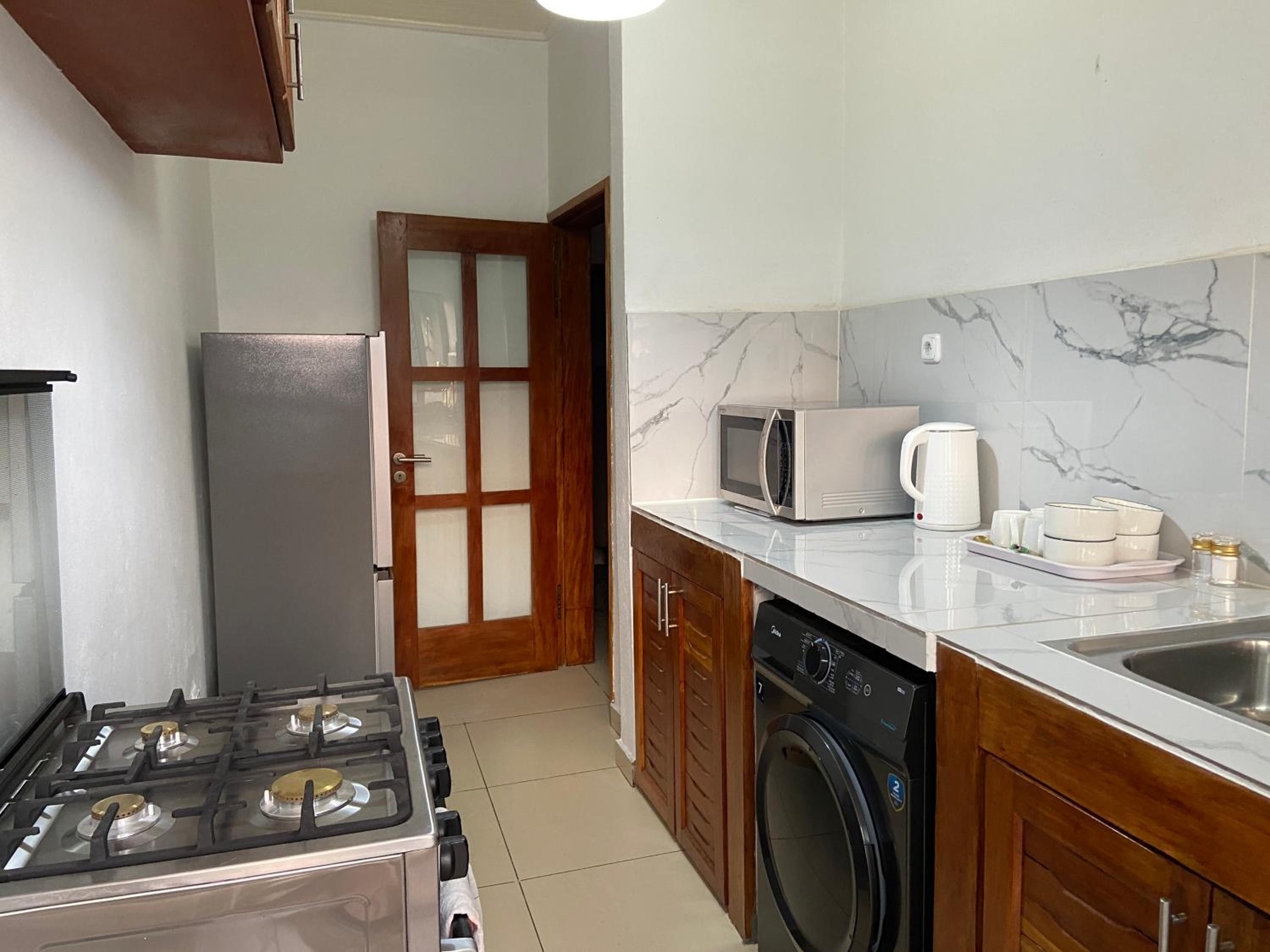 Stylish African-Chic Apartment - WiFi, Gardien, Parking, Climaté