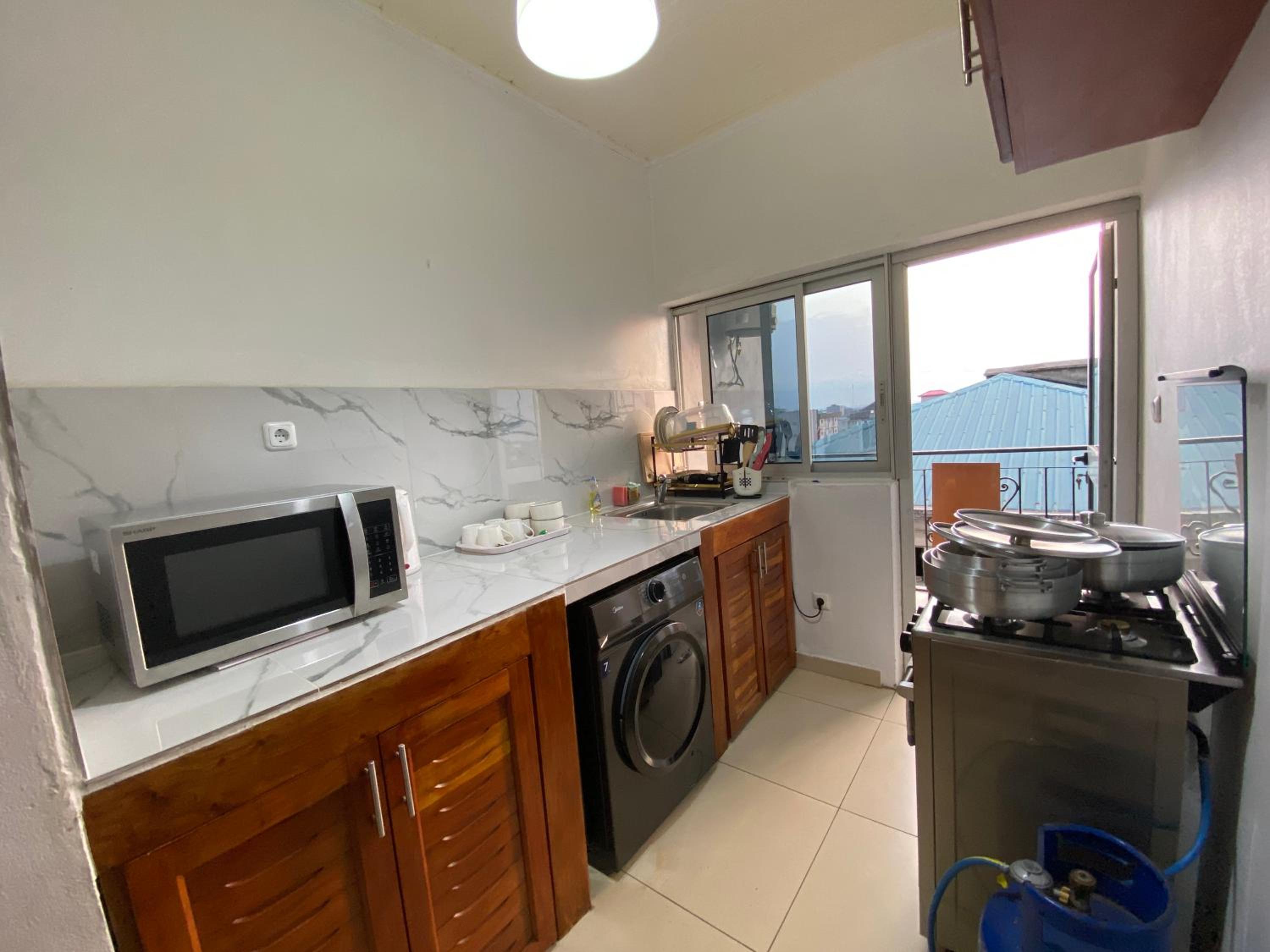 Stylish African-Chic Apartment - WiFi, Gardien, Parking, Climaté