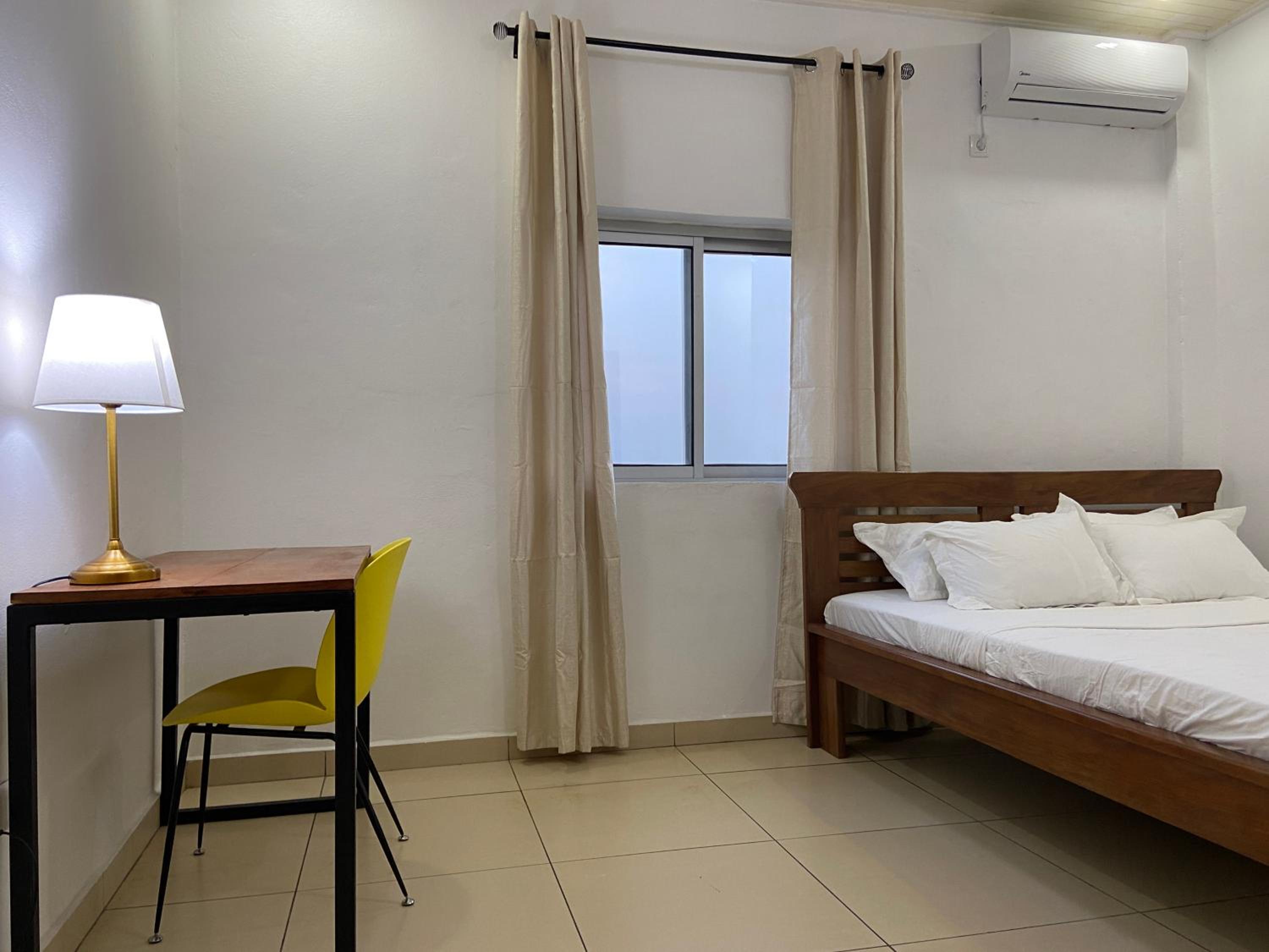 Stylish African-Chic Apartment - WiFi, Gardien, Parking, Climaté