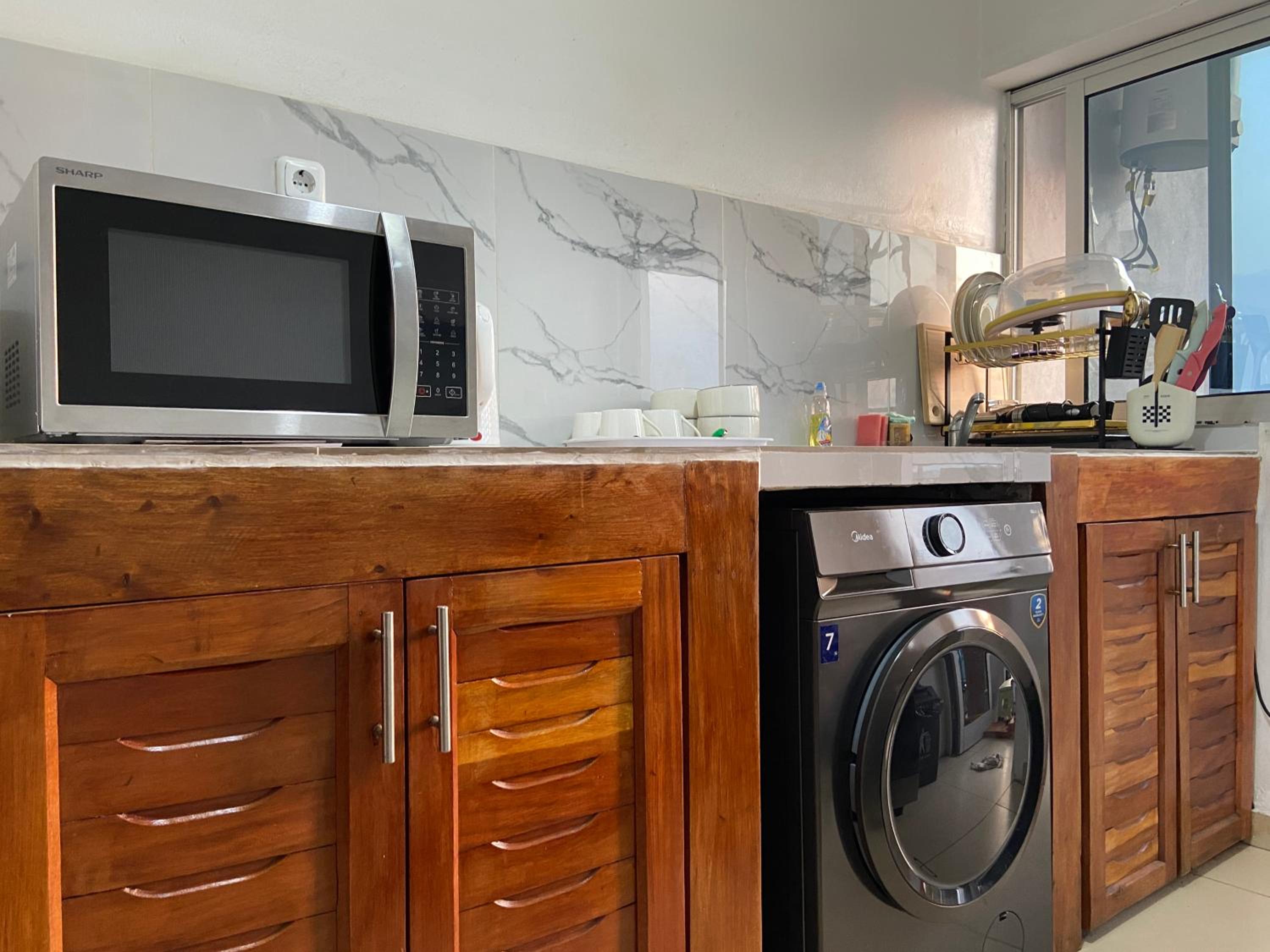 Stylish African-Chic Apartment - WiFi, Gardien, Parking, Climaté