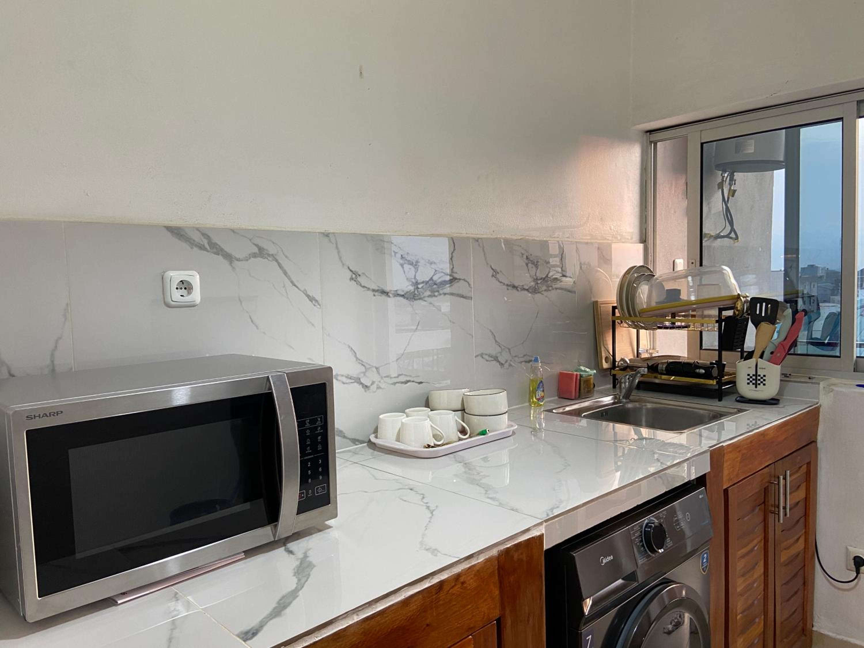 Stylish African-Chic Apartment - WiFi, Gardien, Parking, Climaté