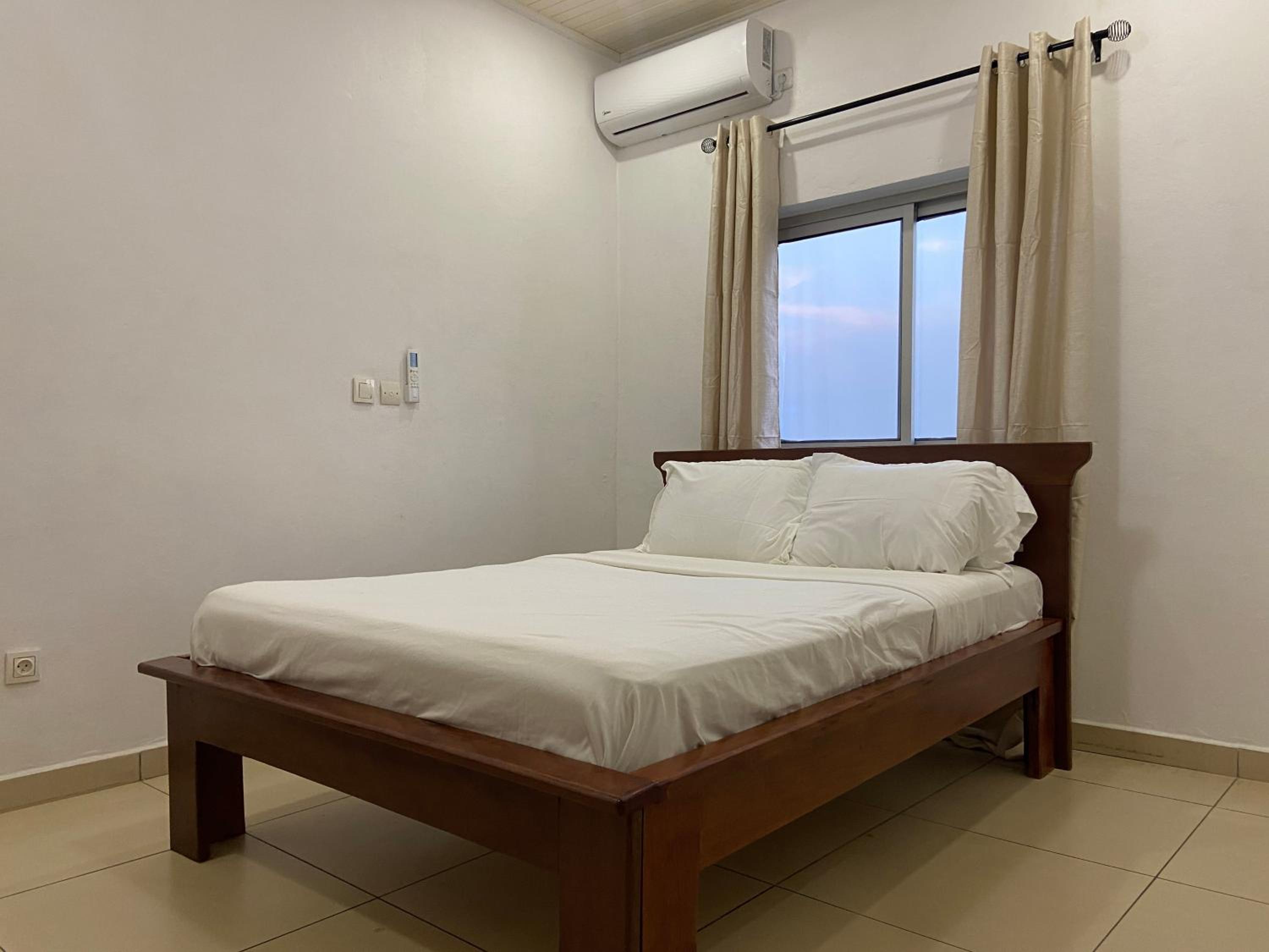 Stylish African-Chic Apartment - WiFi, Gardien, Parking, Climaté