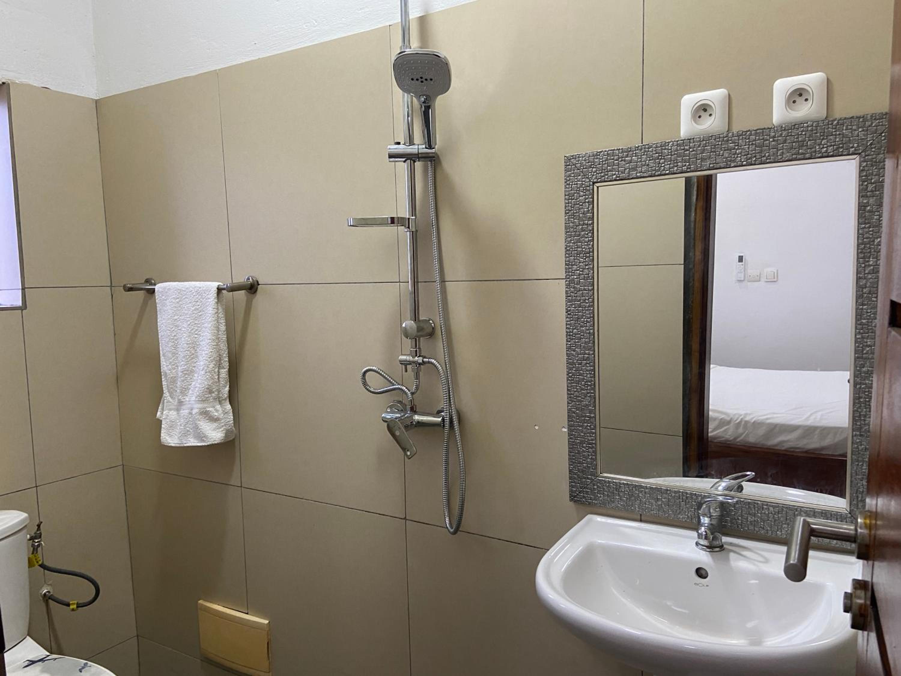 Stylish African-Chic Apartment - WiFi, Gardien, Parking, Climaté