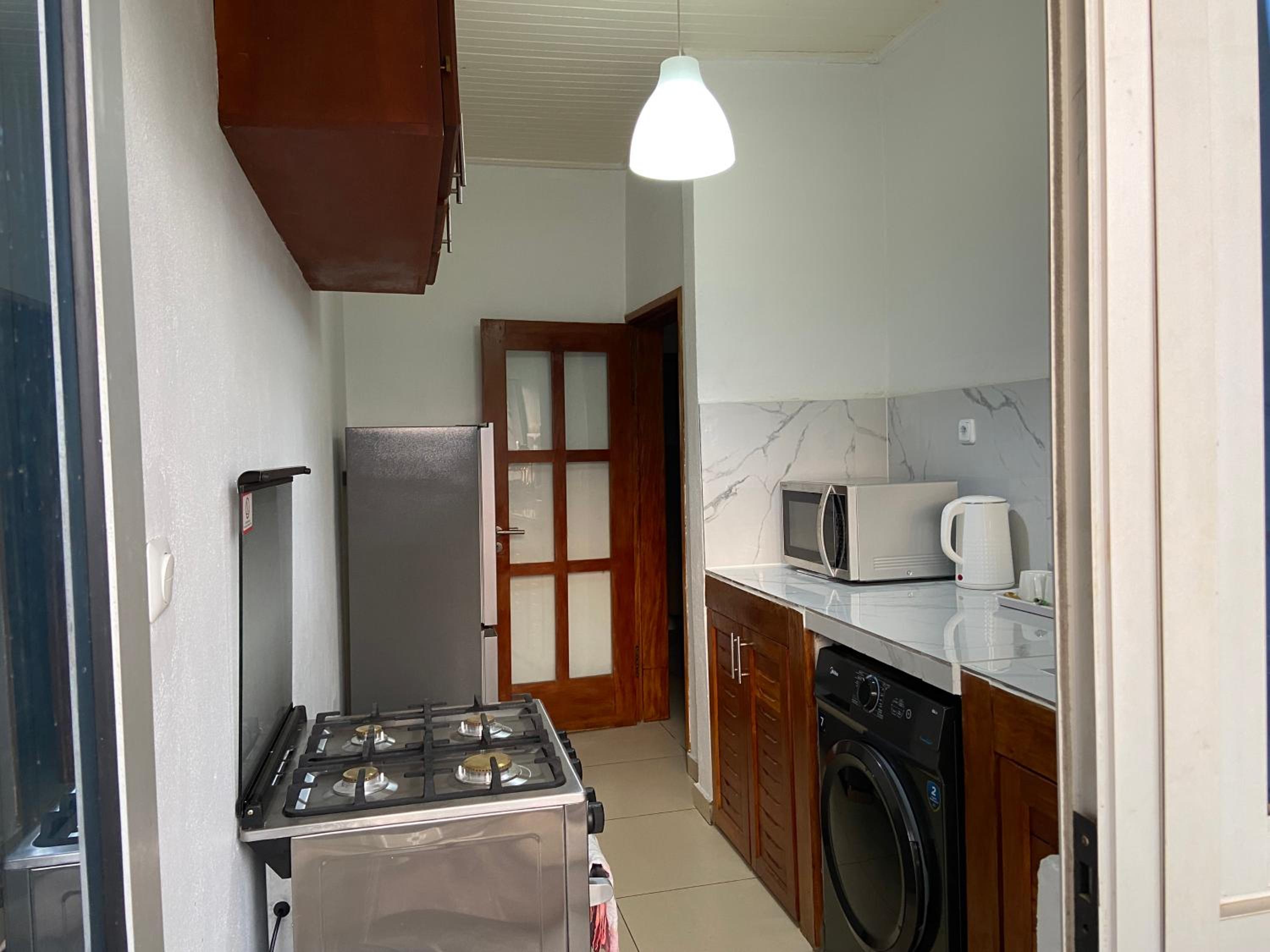 Stylish African-Chic Apartment - WiFi, Gardien, Parking, Climaté