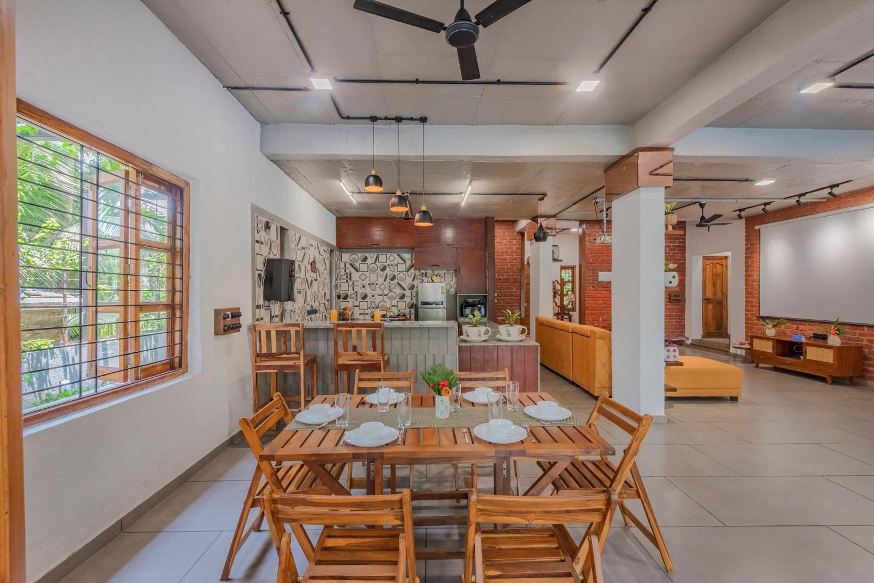 SaffronStays Atmos - 3BR rustic pool villa with projector screen, table tennis, carrom & cozy family spaces in Nagaon view 3