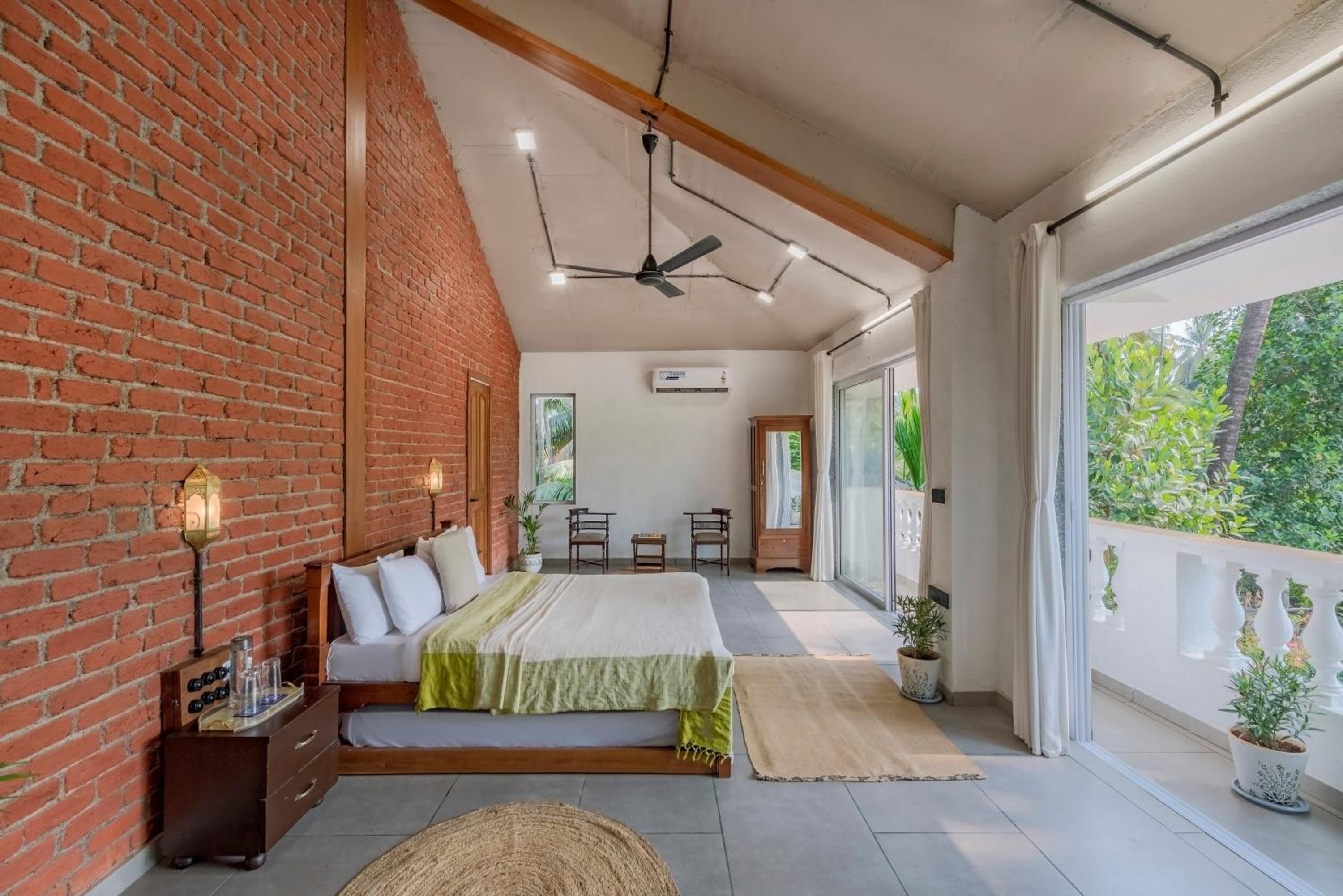 SaffronStays Atmos - 3BR rustic pool villa with projector screen, table tennis, carrom & cozy family spaces in Nagaon view 5