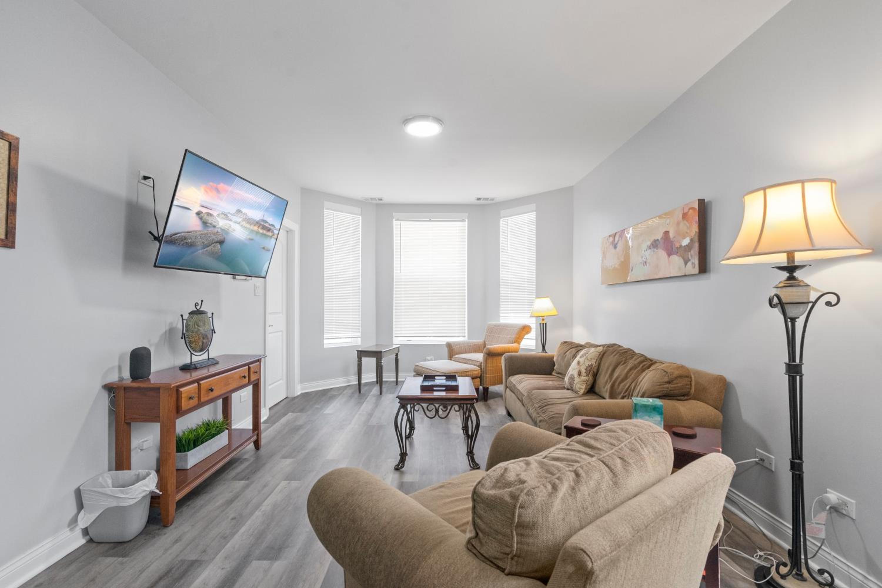 Newly rehabbed Greystone with 2 private apartments, backyard, garage, laundry, close to expressway view 5