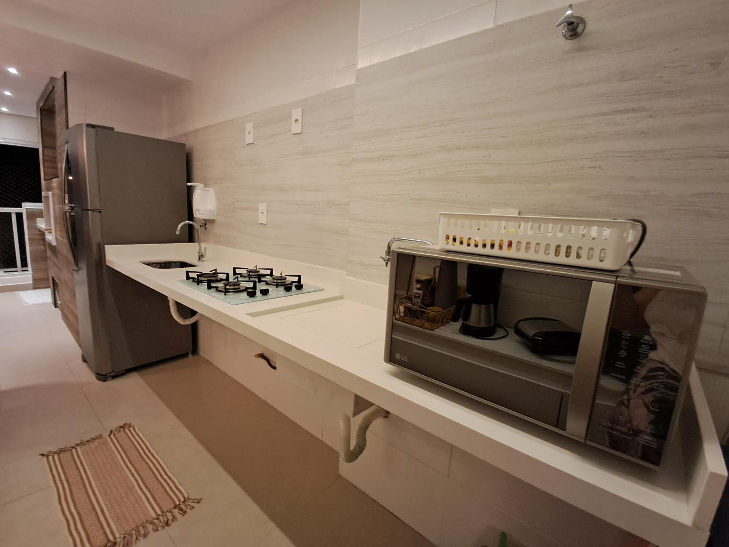 Apto Enseada Guarujá com Terraço Gourmet a 5 minutos da praia