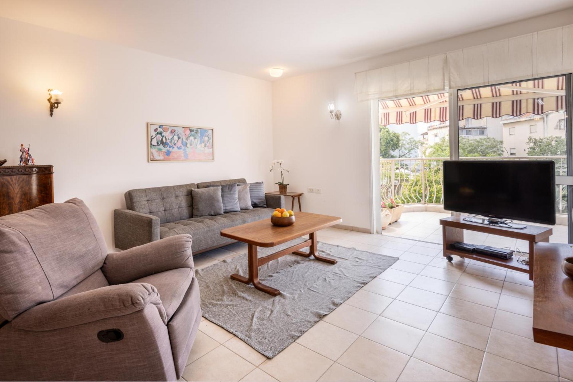 Homey Serenity Kiryat Haim Apartment with Mamad by Sea N Rent view 2