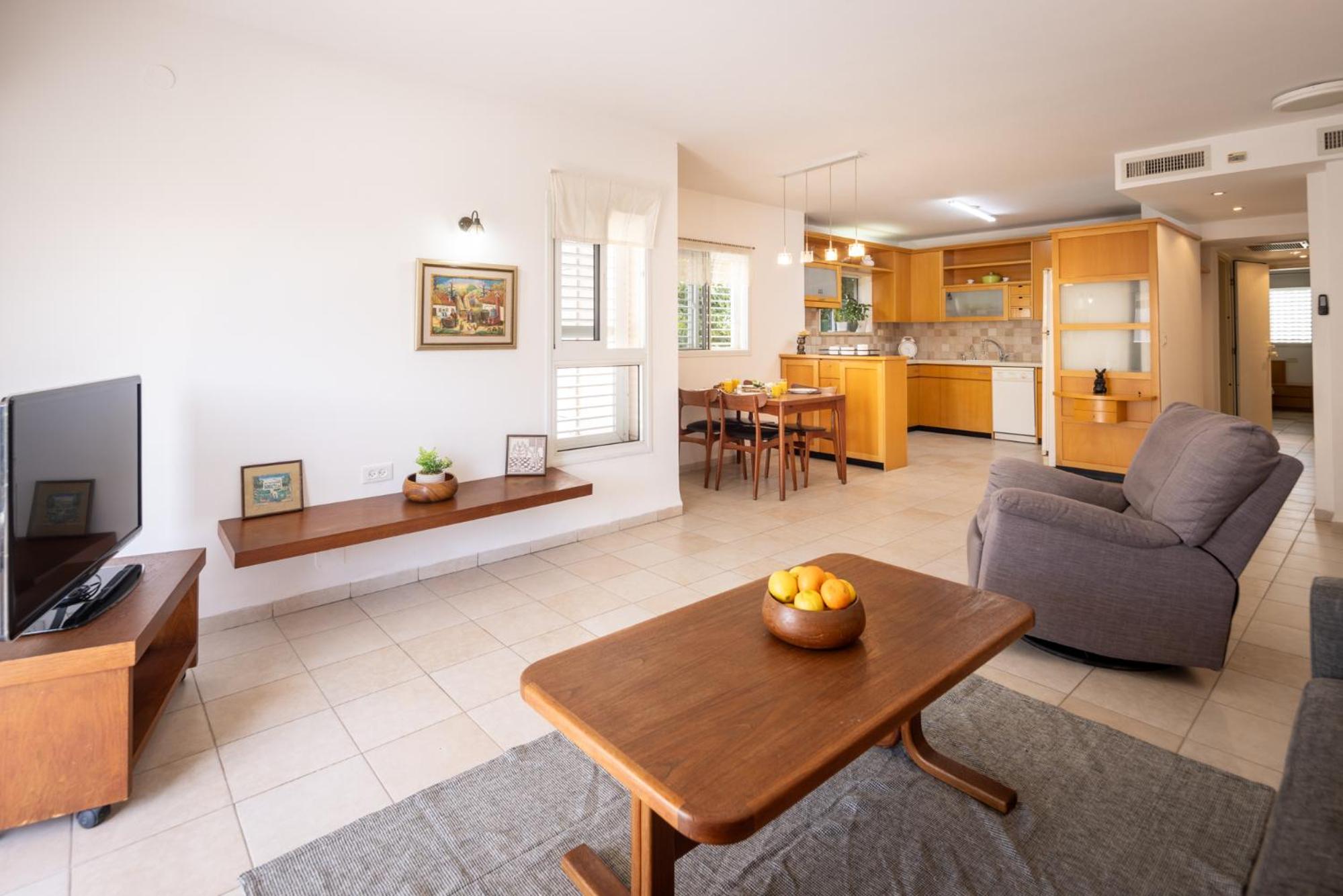 Homey Serenity Kiryat Haim Apartment with Mamad by Sea N Rent view 4