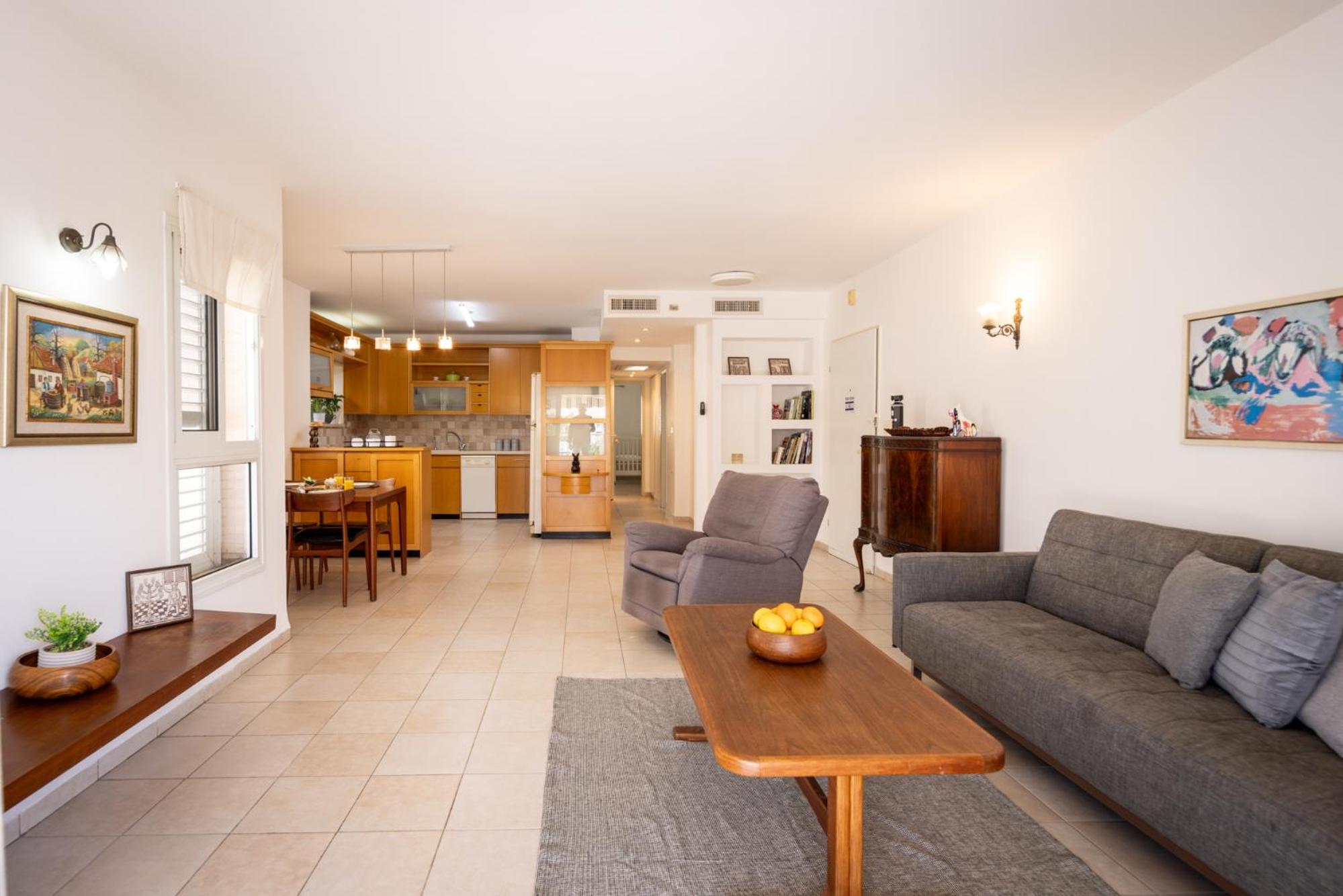Homey Serenity Kiryat Haim Apartment with Mamad by Sea N Rent view 5