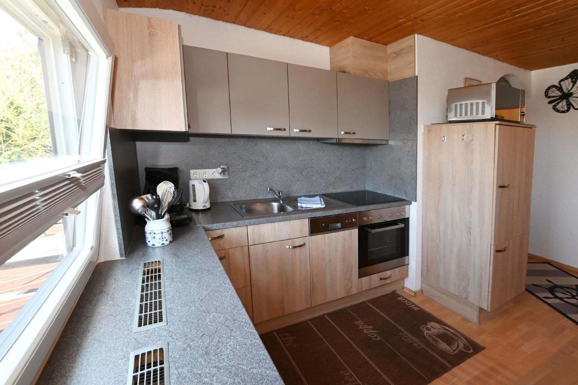 Lily 04 3 Zimmer Ferienwohnung mit Balkon in West Lage befindet sich ohne Durchgangsverkehr in Büsum