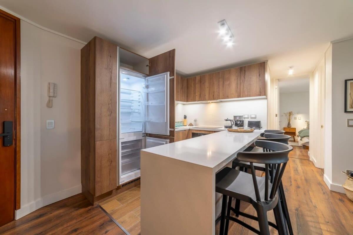 Descubre la Elegancia 2 habitaciones en Las Condes