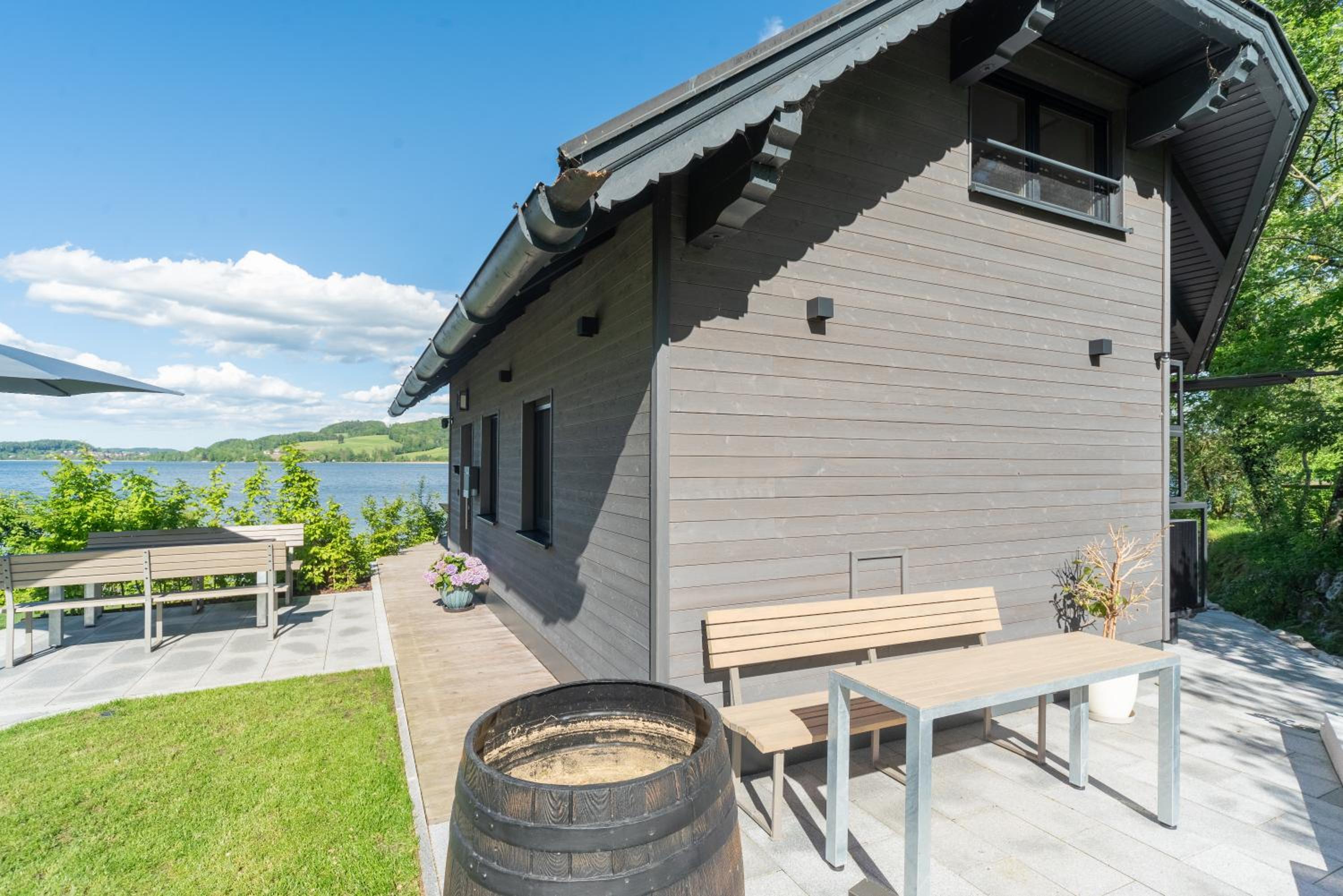 Exklusives Seehaus LAKEHOUSE in Bestlage mit privaten Sandstrand und eigenem Boot und SUP