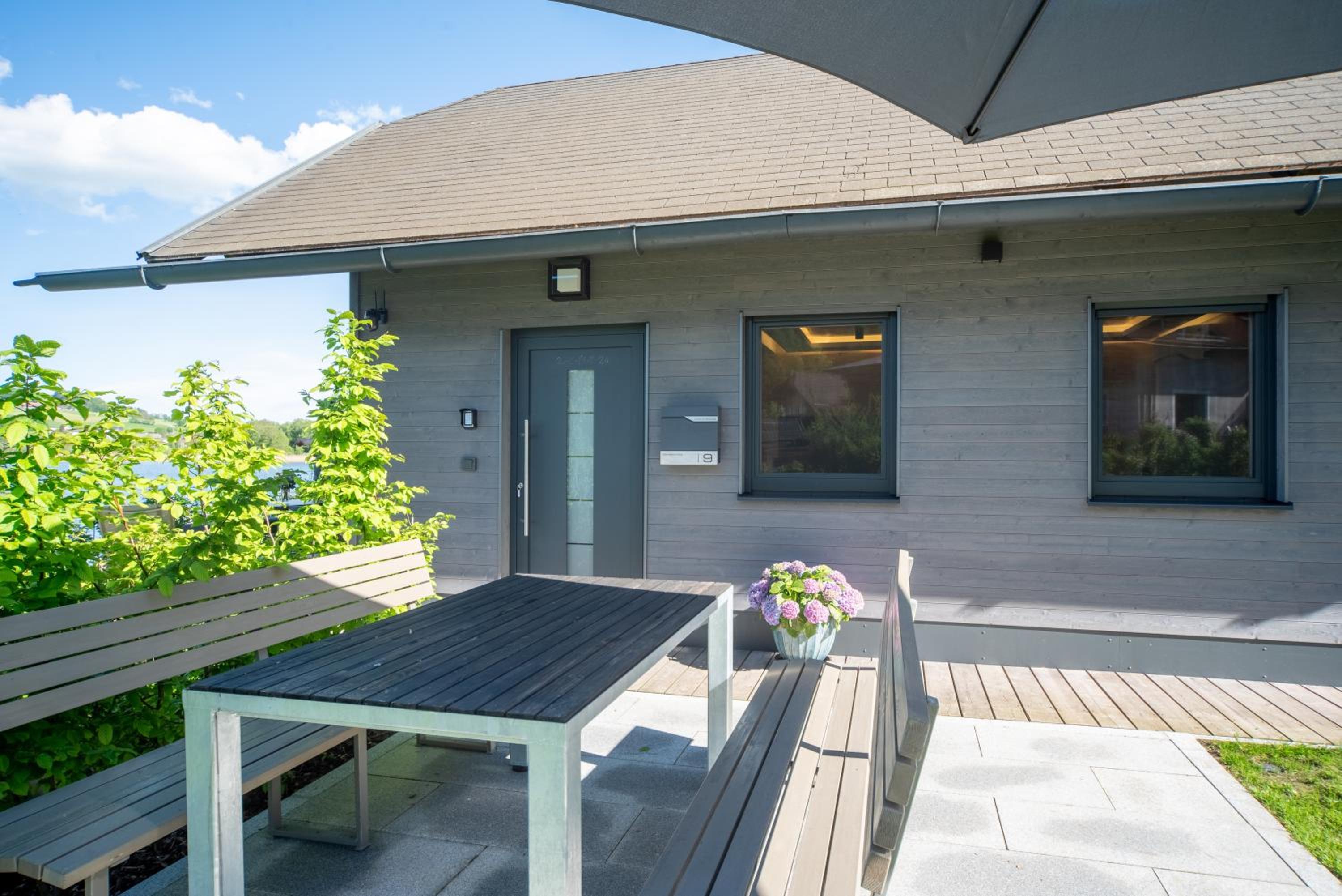 Exklusives Seehaus LAKEHOUSE in Bestlage mit privaten Sandstrand und eigenem Boot und SUP