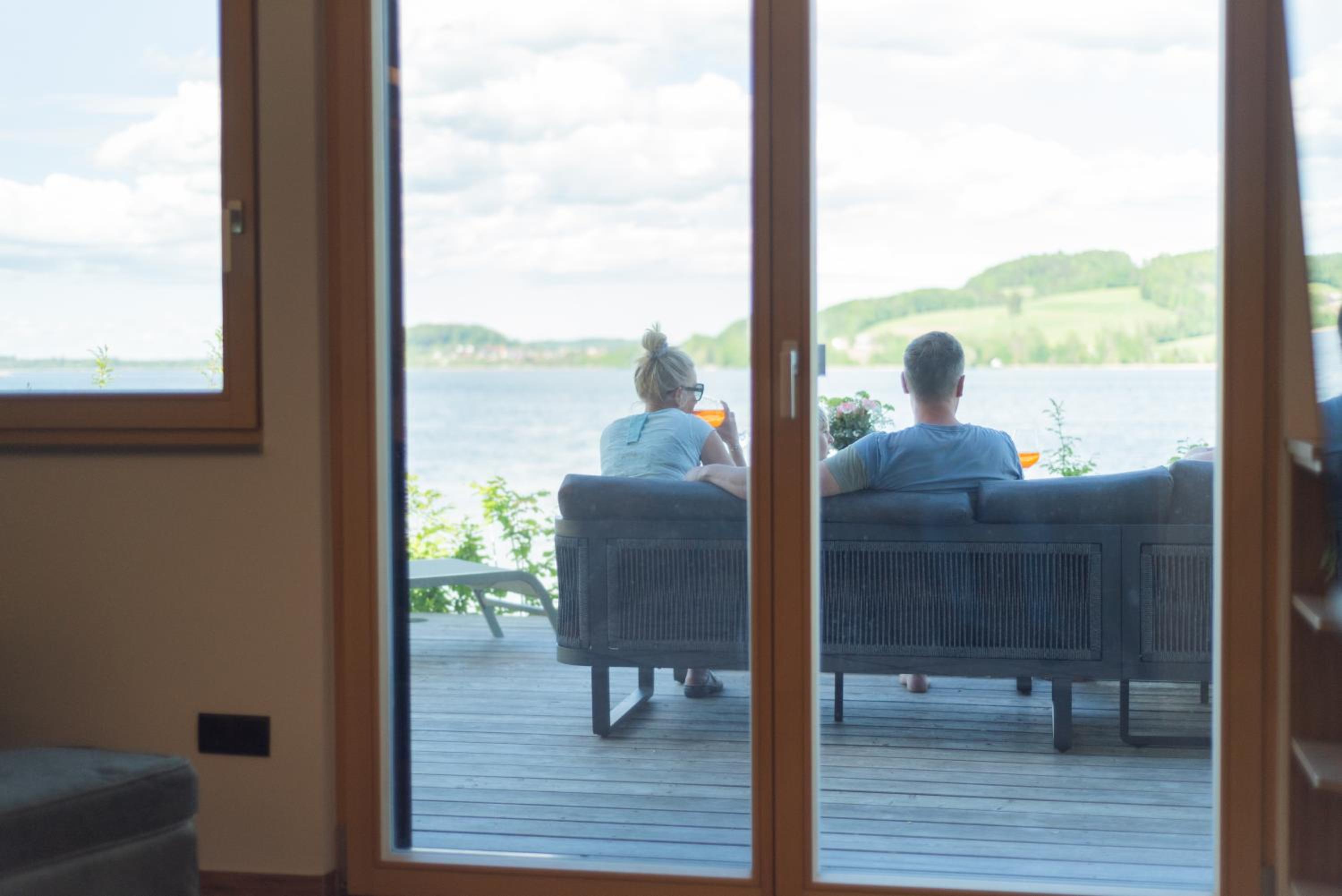 Exklusives Seehaus LAKEHOUSE in Bestlage mit privaten Sandstrand und eigenem Boot und SUP