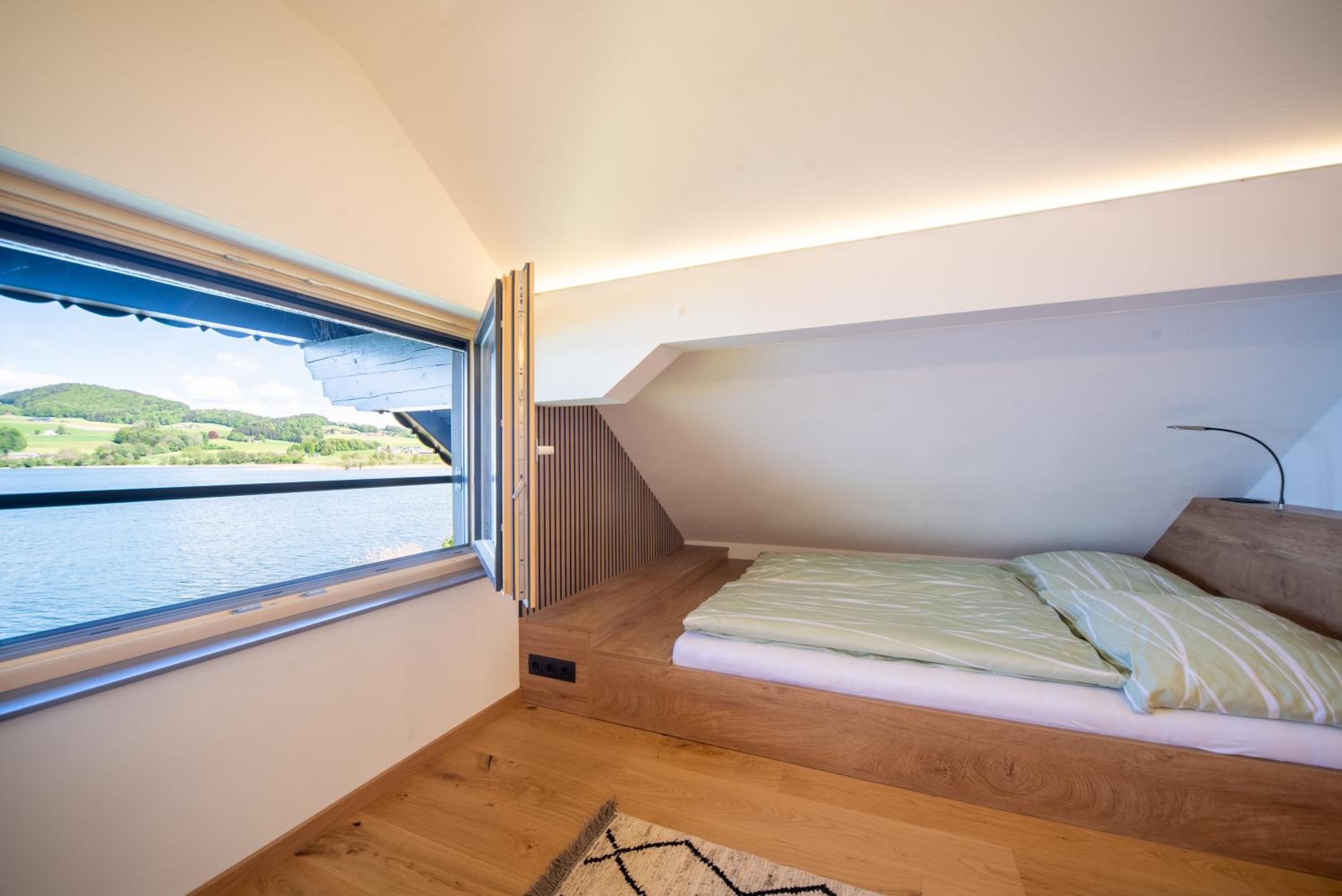 Exklusives Seehaus LAKEHOUSE in Bestlage mit privaten Sandstrand und eigenem Boot und SUP