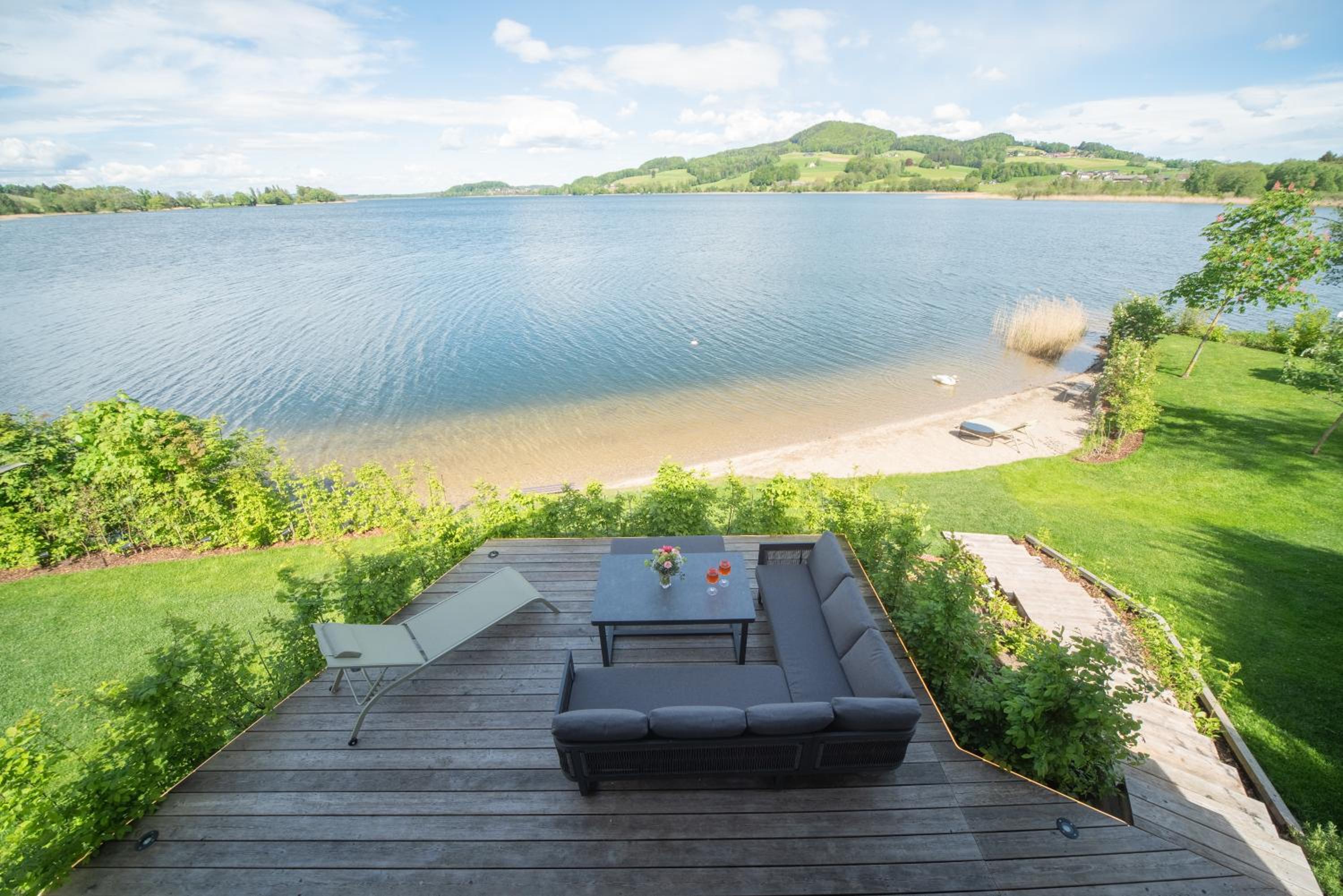 Exklusives Seehaus LAKEHOUSE in Bestlage mit privaten Sandstrand und eigenem Boot und SUP