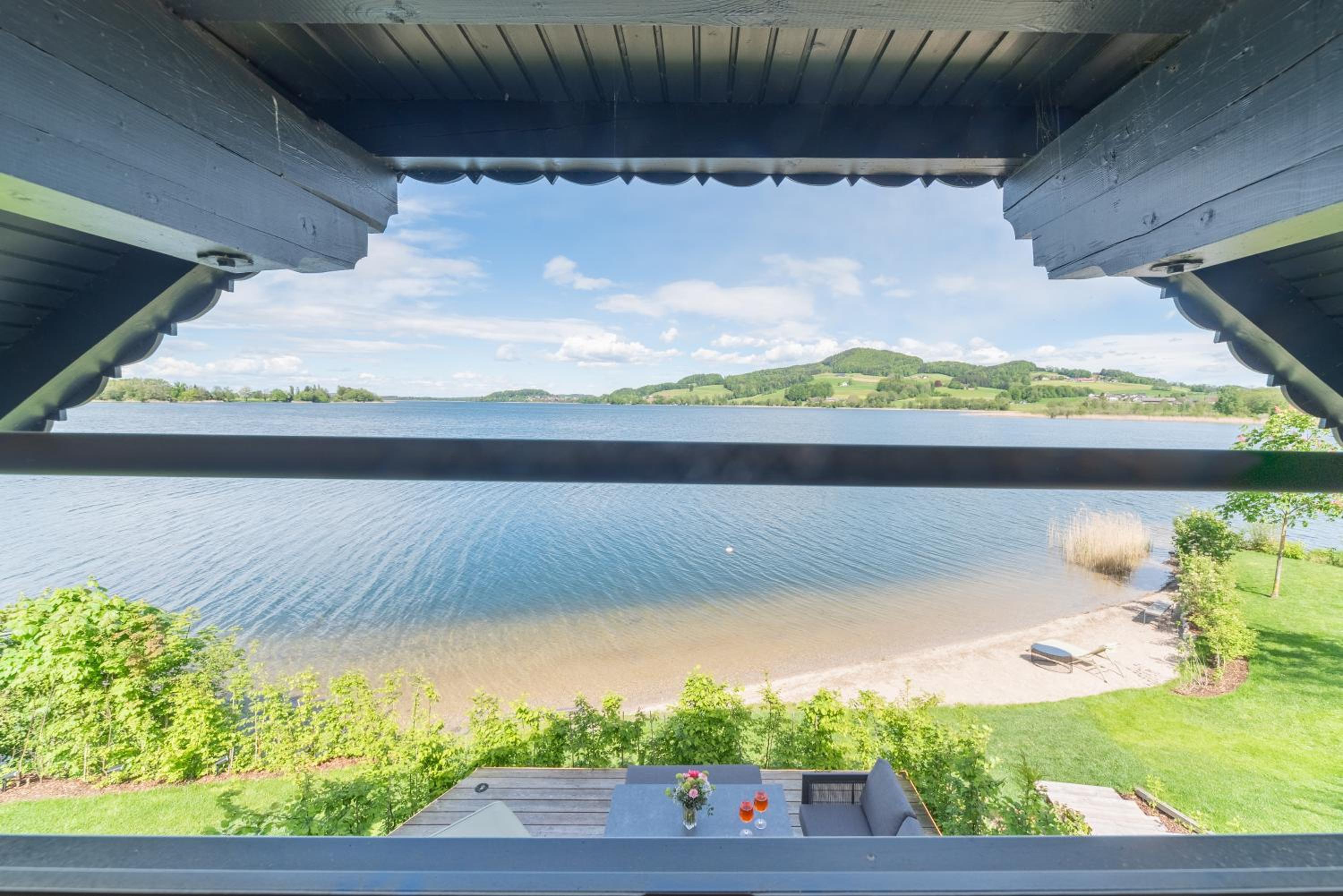 Exklusives Seehaus LAKEHOUSE in Bestlage mit privaten Sandstrand und eigenem Boot und SUP