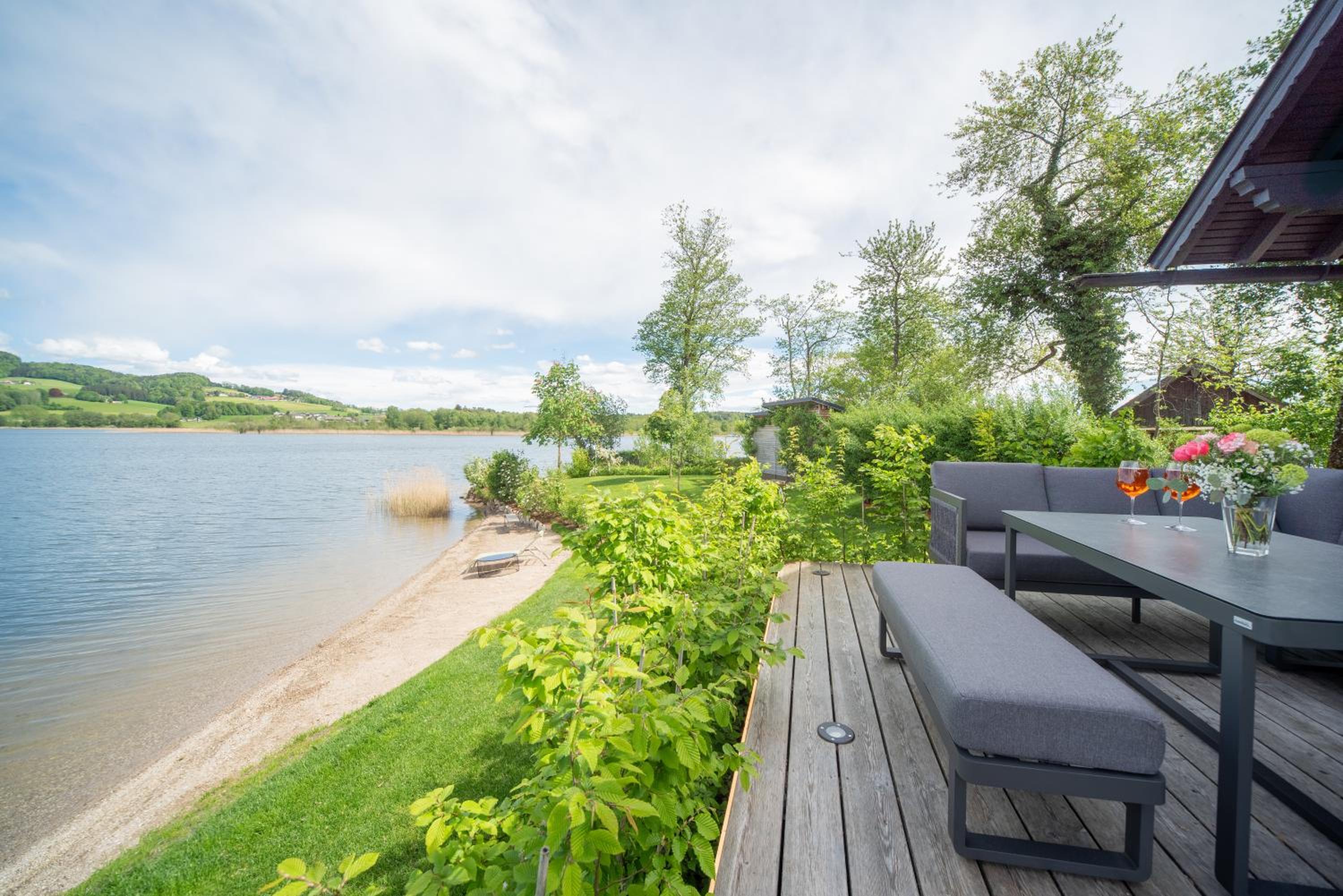 Exklusives Seehaus LAKEHOUSE in Bestlage mit privaten Sandstrand und eigenem Boot und SUP