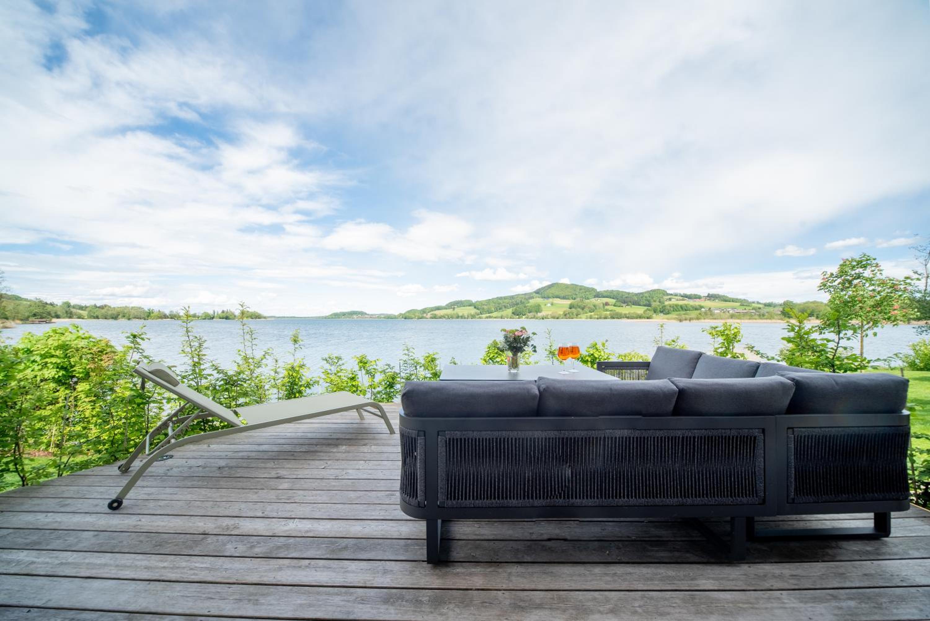 Exklusives Seehaus LAKEHOUSE in Bestlage mit privaten Sandstrand und eigenem Boot und SUP