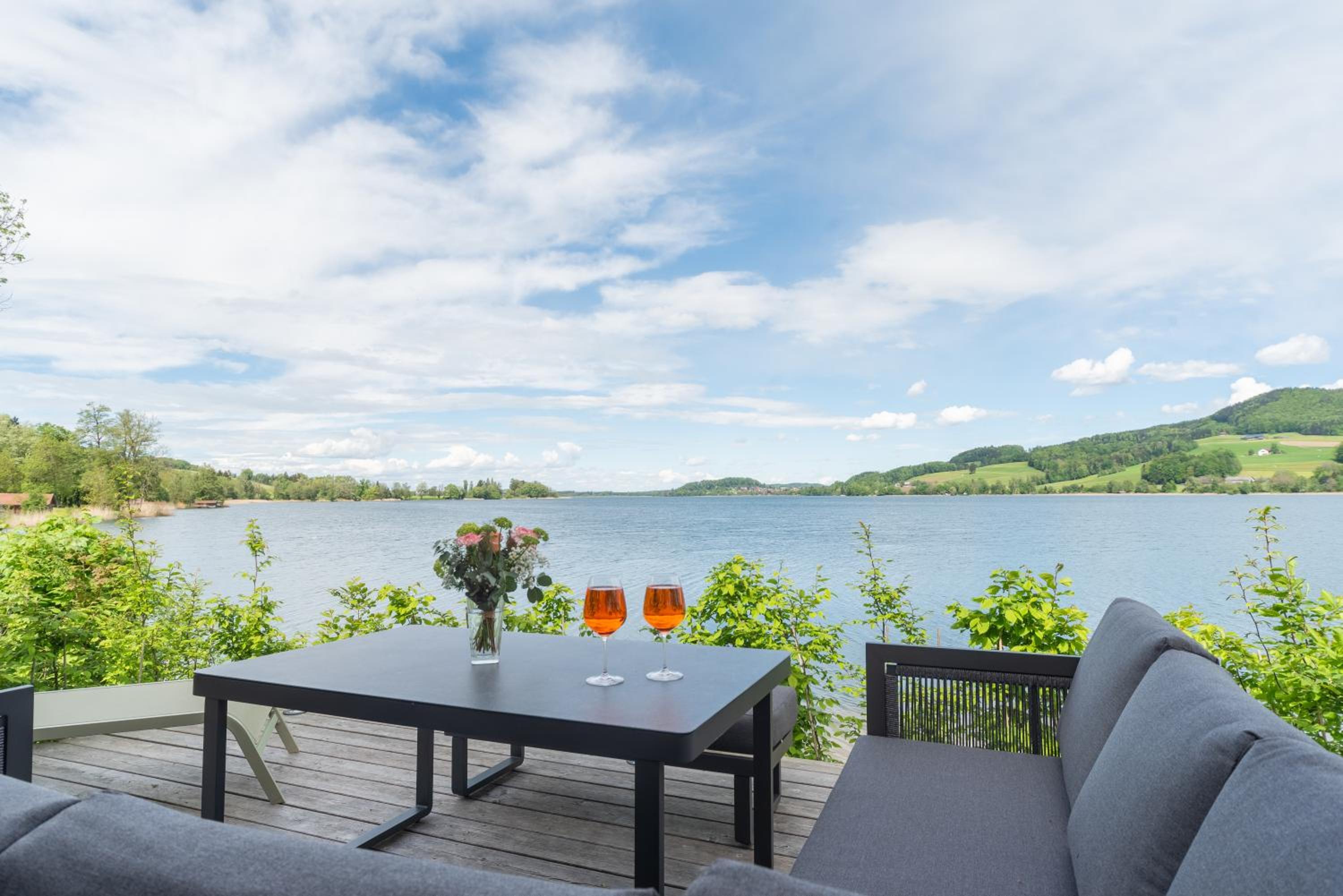 Exklusives Seehaus LAKEHOUSE in Bestlage mit privaten Sandstrand und eigenem Boot und SUP