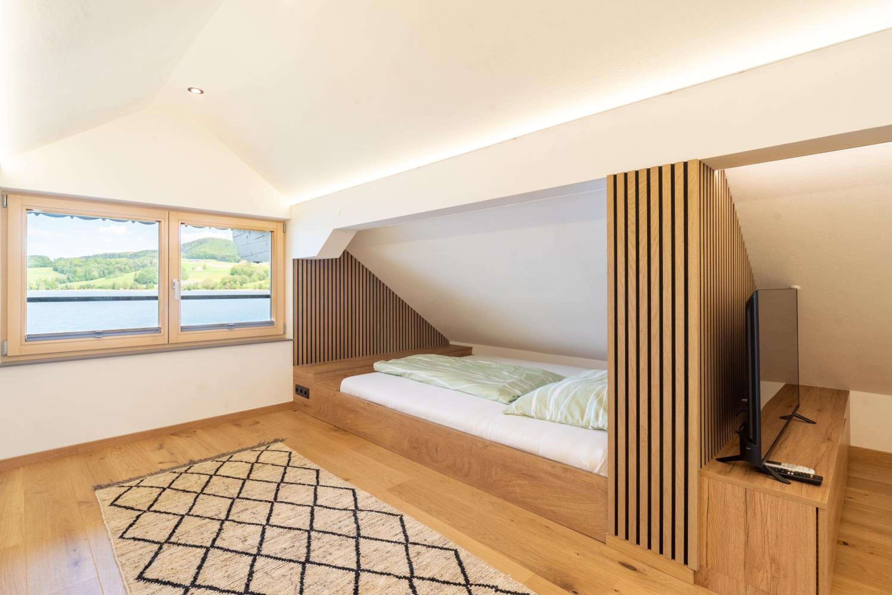 Exklusives Seehaus LAKEHOUSE in Bestlage mit privaten Sandstrand und eigenem Boot und SUP