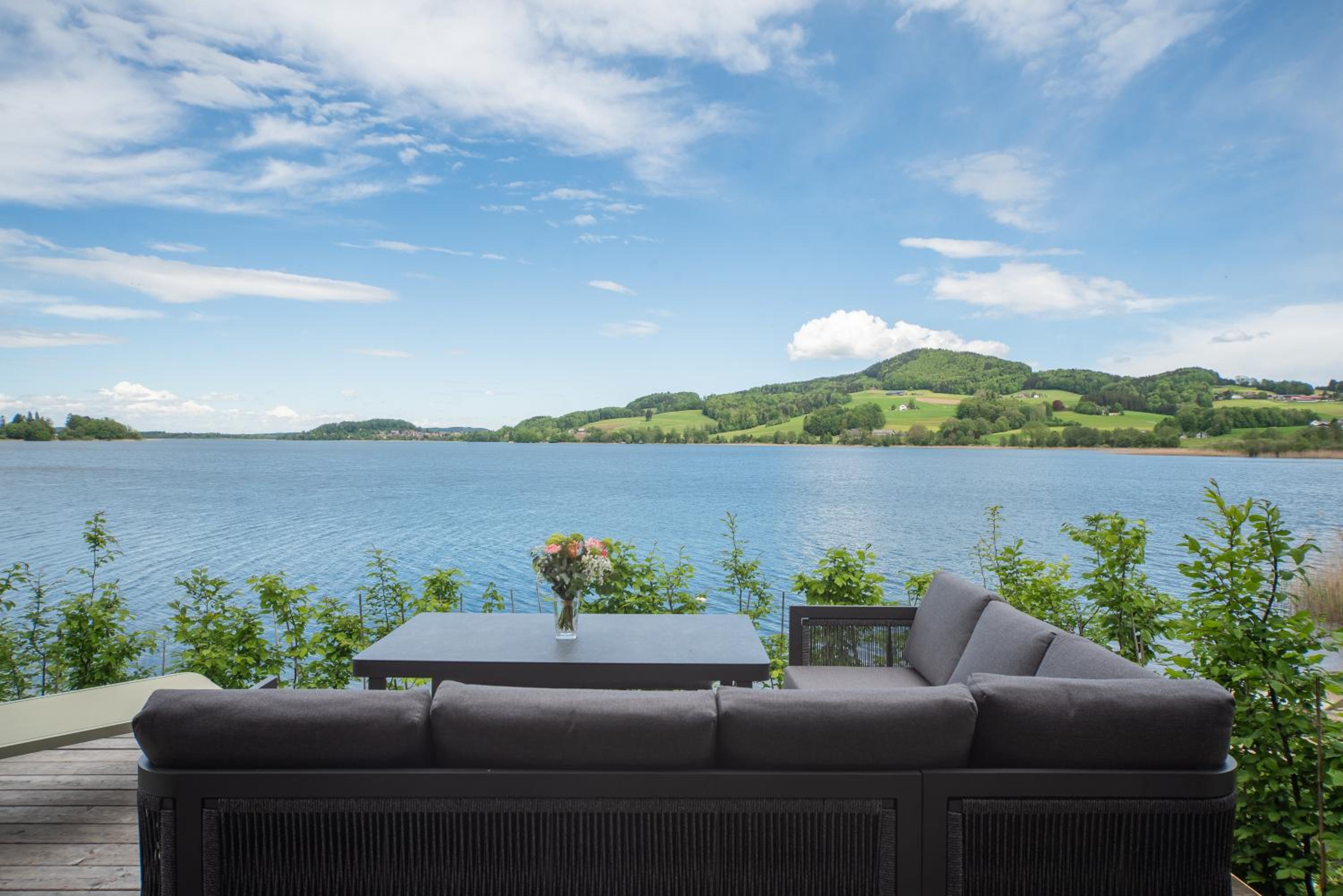 Exklusives Seehaus LAKEHOUSE in Bestlage mit privaten Sandstrand und eigenem Boot und SUP