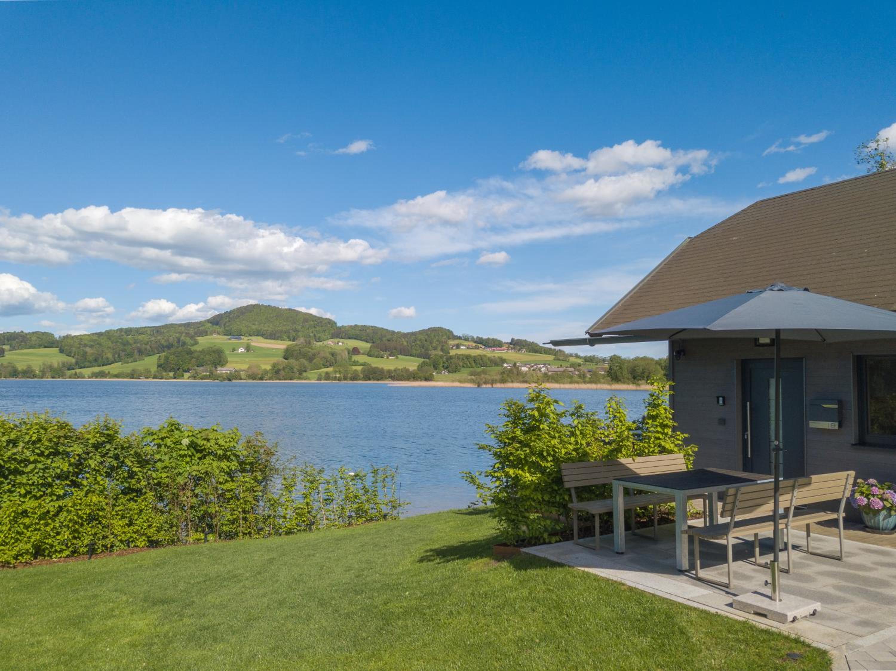 Exklusives Seehaus LAKEHOUSE in Bestlage mit privaten Sandstrand und eigenem Boot und SUP