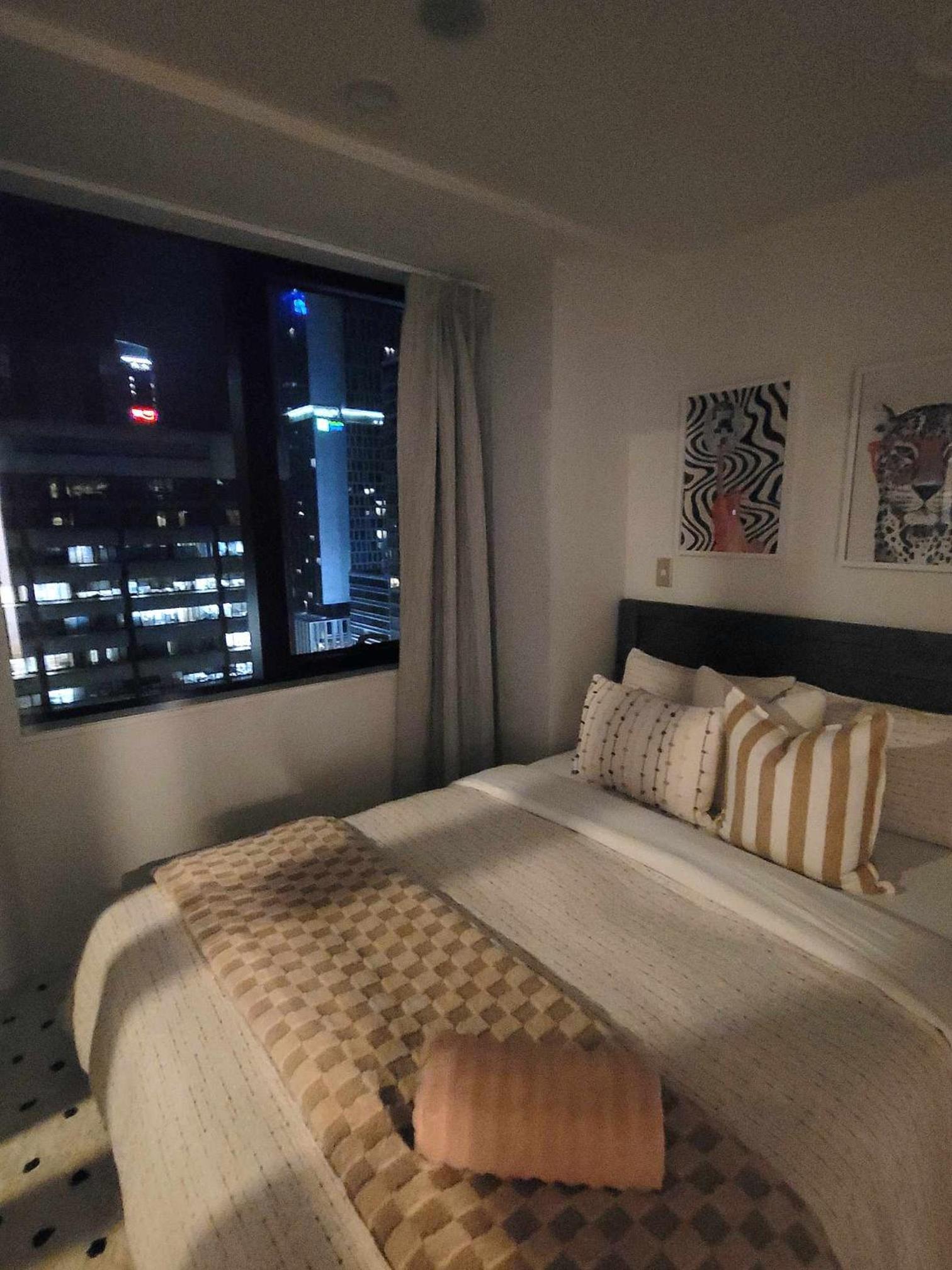 Sky tower just next DOOR FREE parking view 4