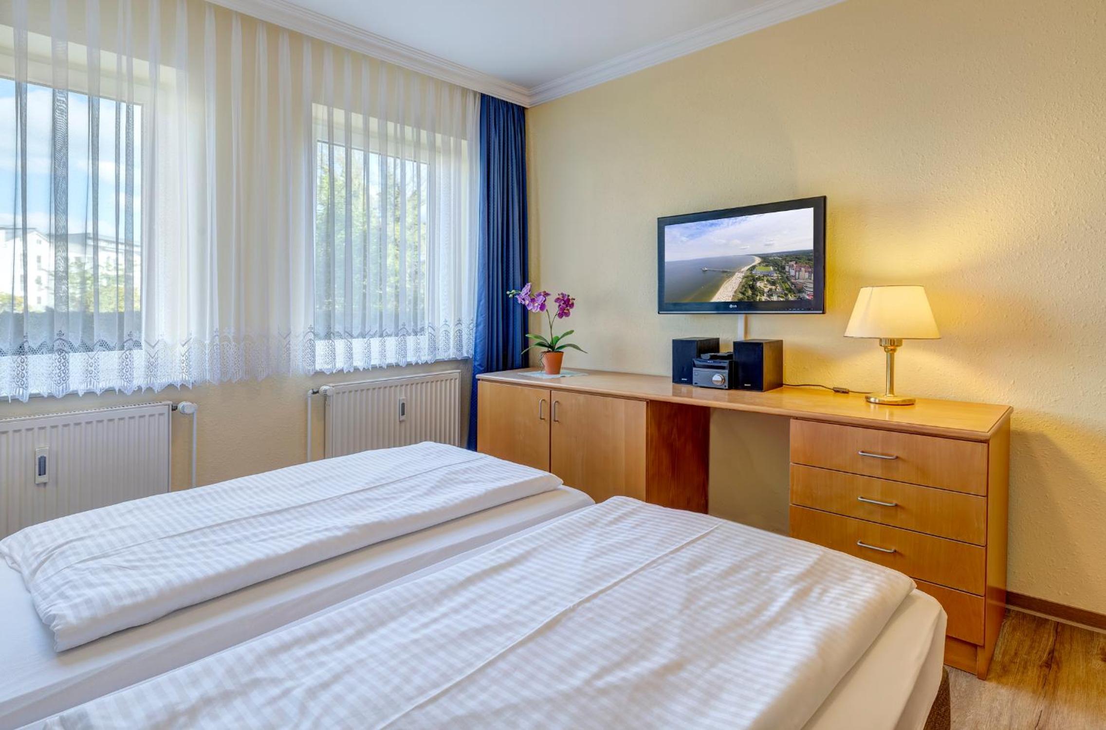 Am Schloonsee Haus C - Apartments mit Strandkorb view 5