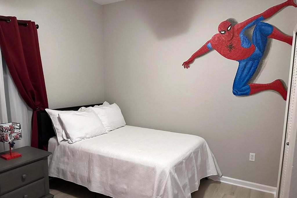 Spider-Man-themed condo near Disney, Sea World, Universal and OCCC with pool, spa, restaurants, shuttle, private balcony, and view of fireworks shows