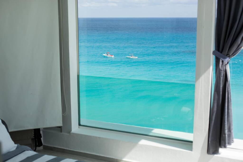 Penthouse a la orilla de la playa con alberca