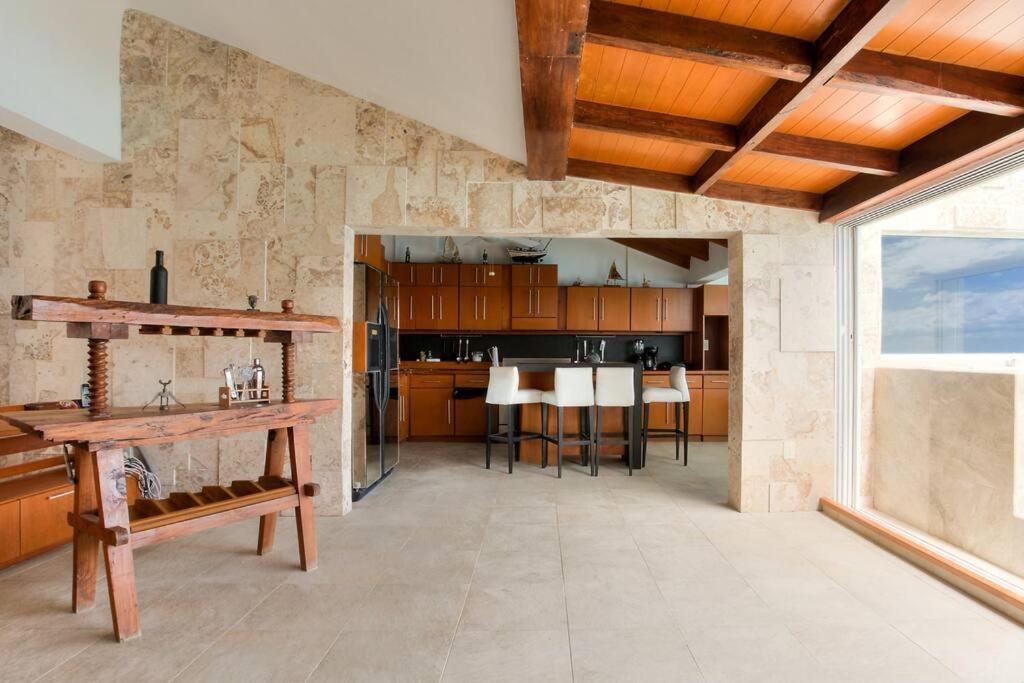 Penthouse a la orilla de la playa con alberca
