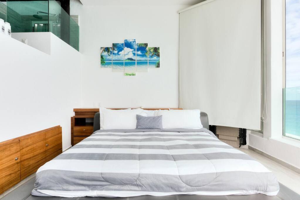 Penthouse a la orilla de la playa con alberca